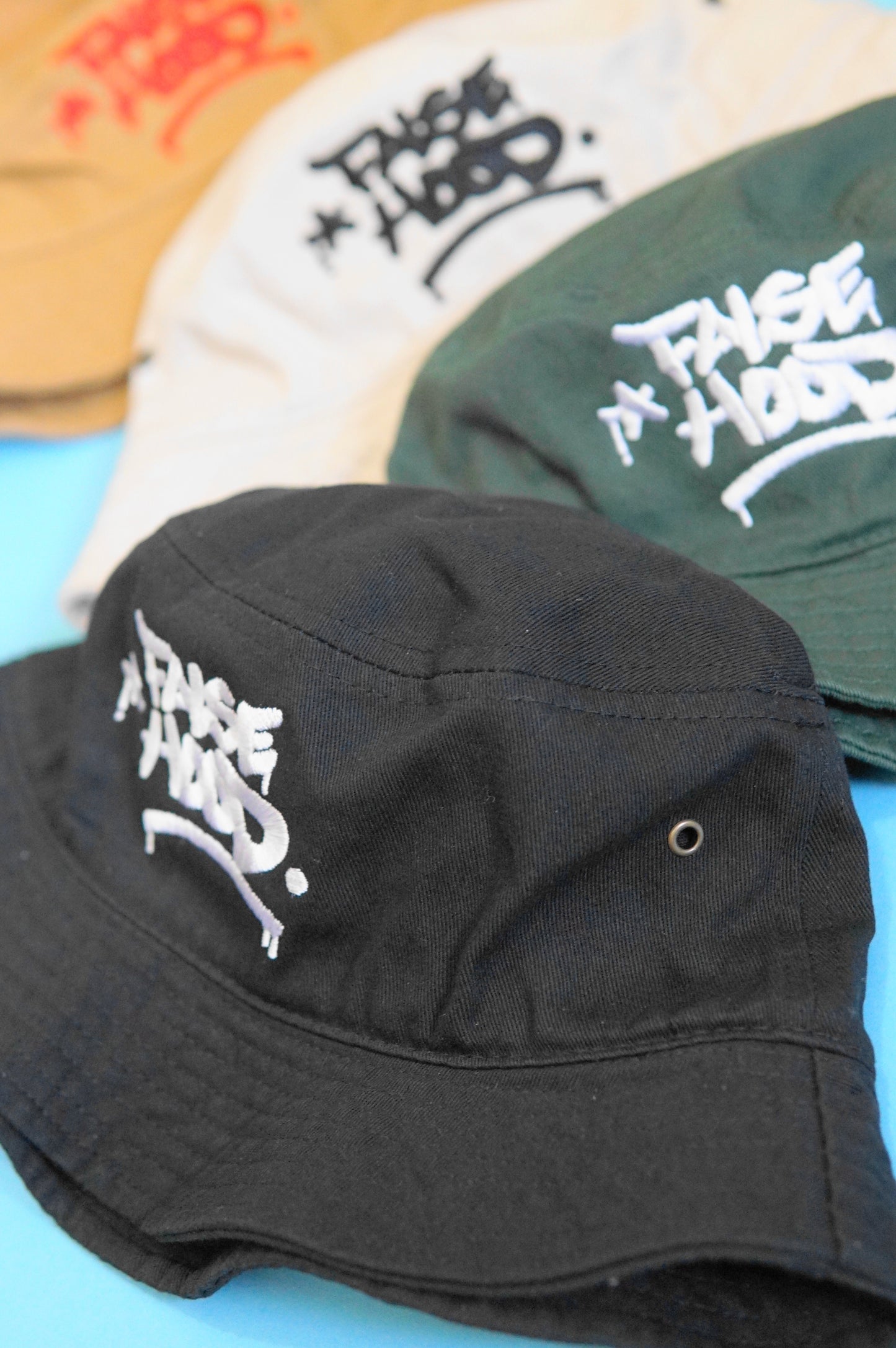 The Big TAG. Bucket Hat - FALSEHOOD.
