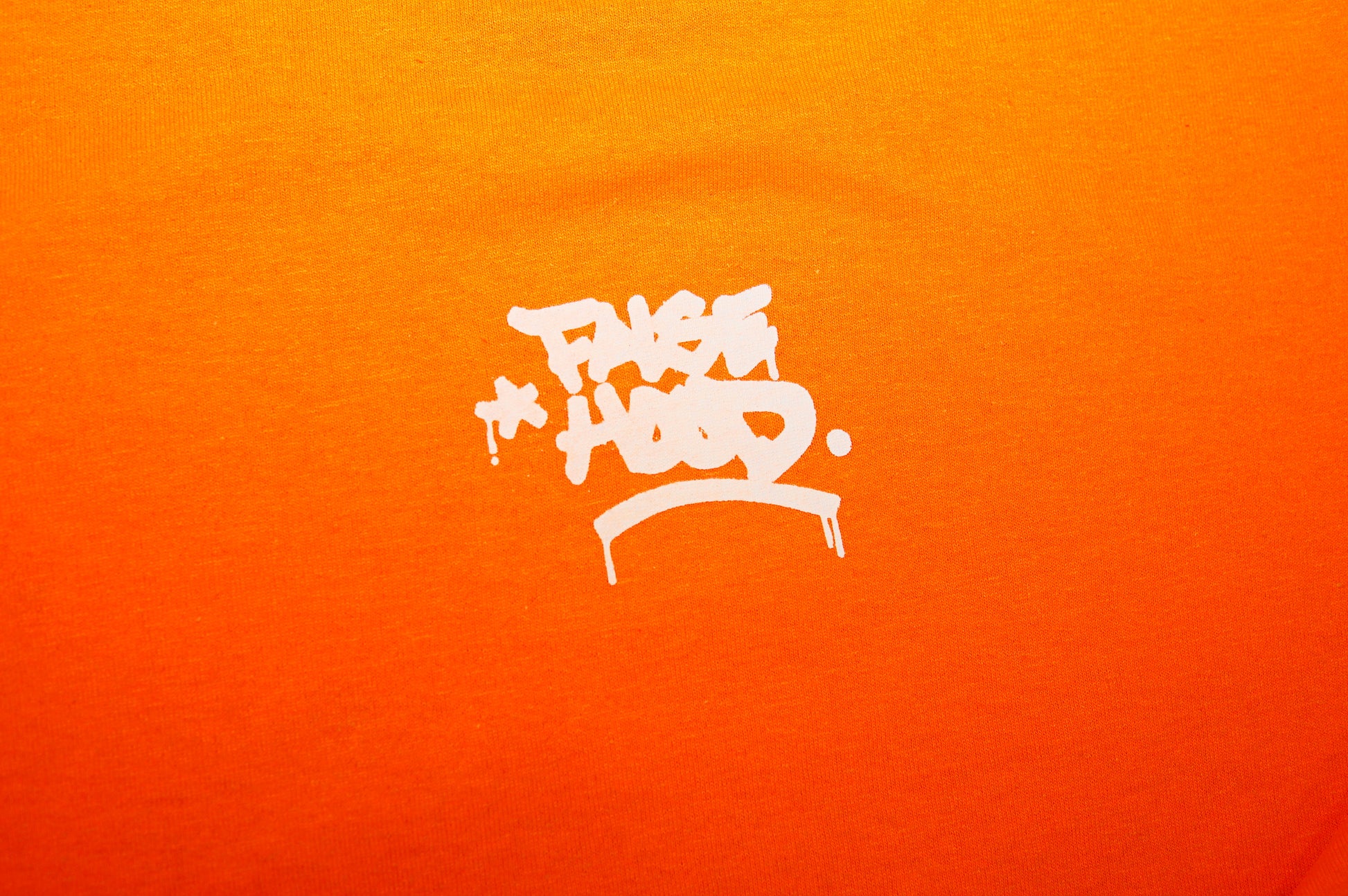 The Community Tee - FALSEHOOD.