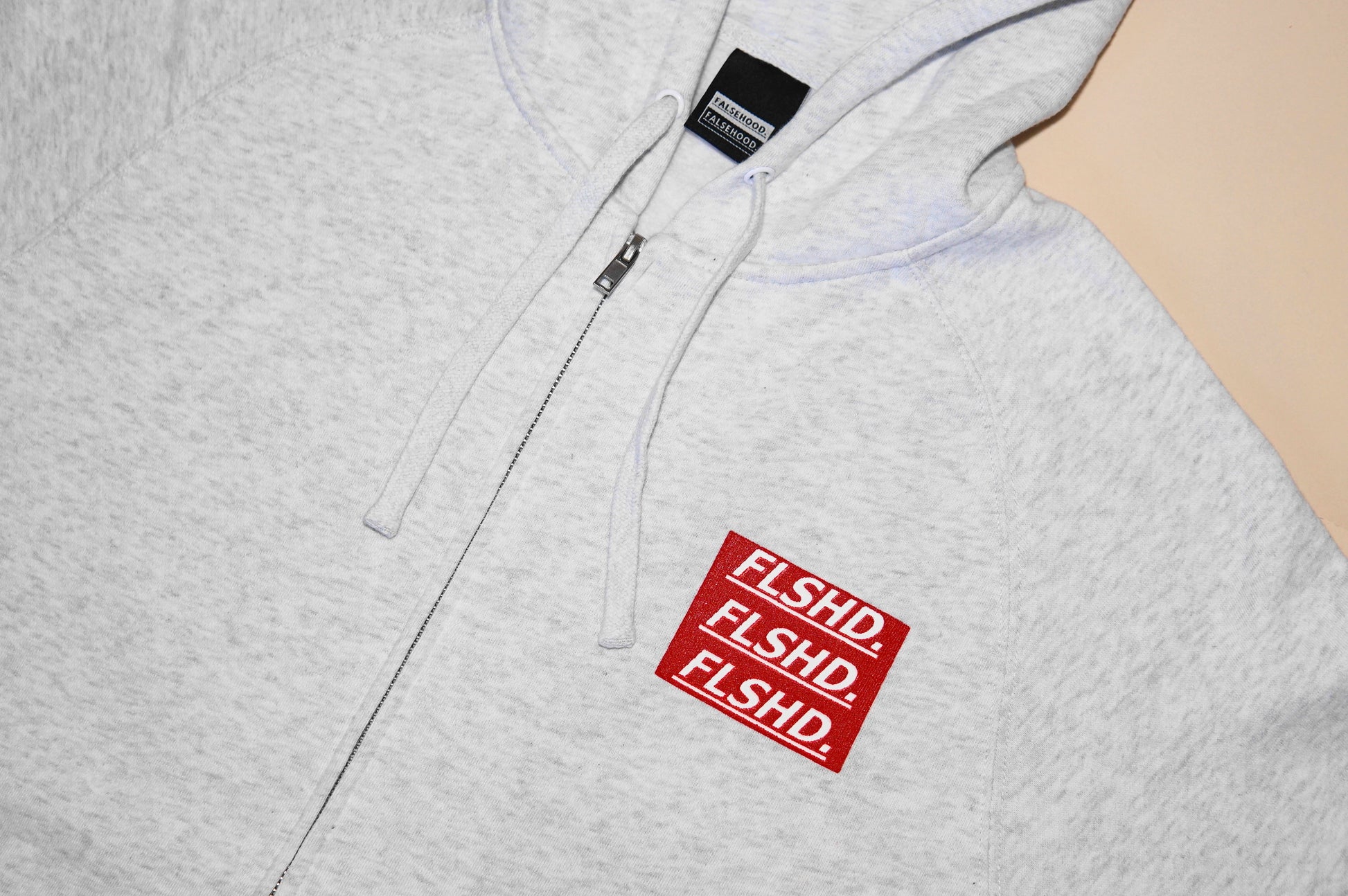 The Big TAG. Stacker Full-Zip Hoody - FALSEHOOD.