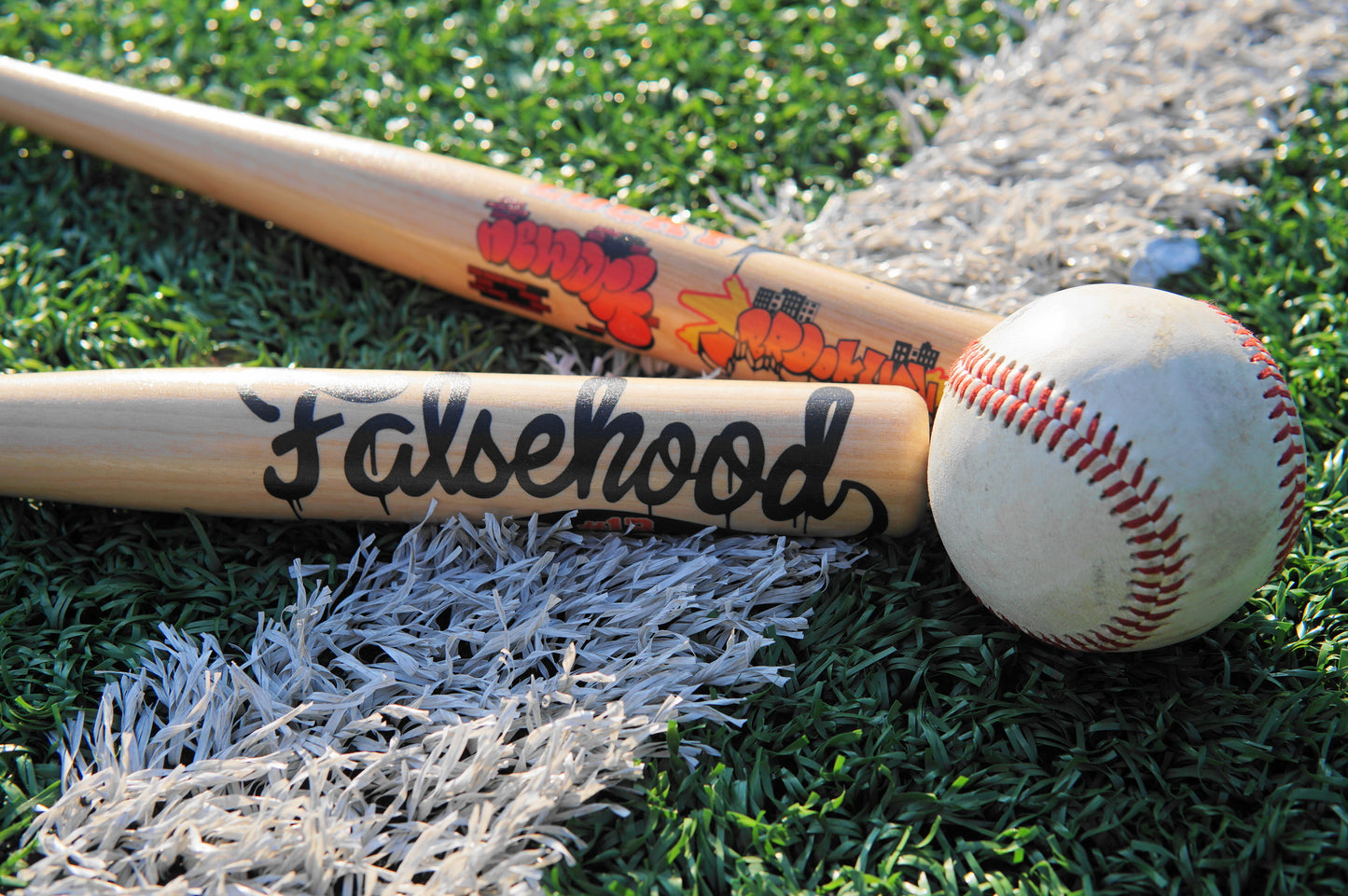HOMETOWNS Mini Baseball Bat - FALSEHOOD.