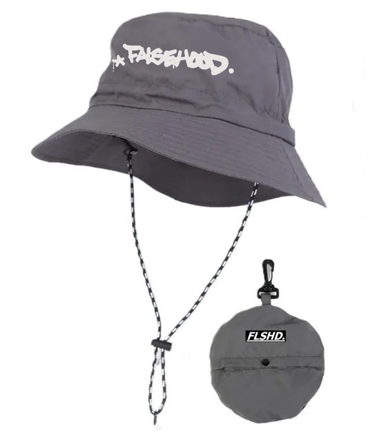 The Big TAG. Runner Waterproof Bucket Hat - FALSEHOOD.