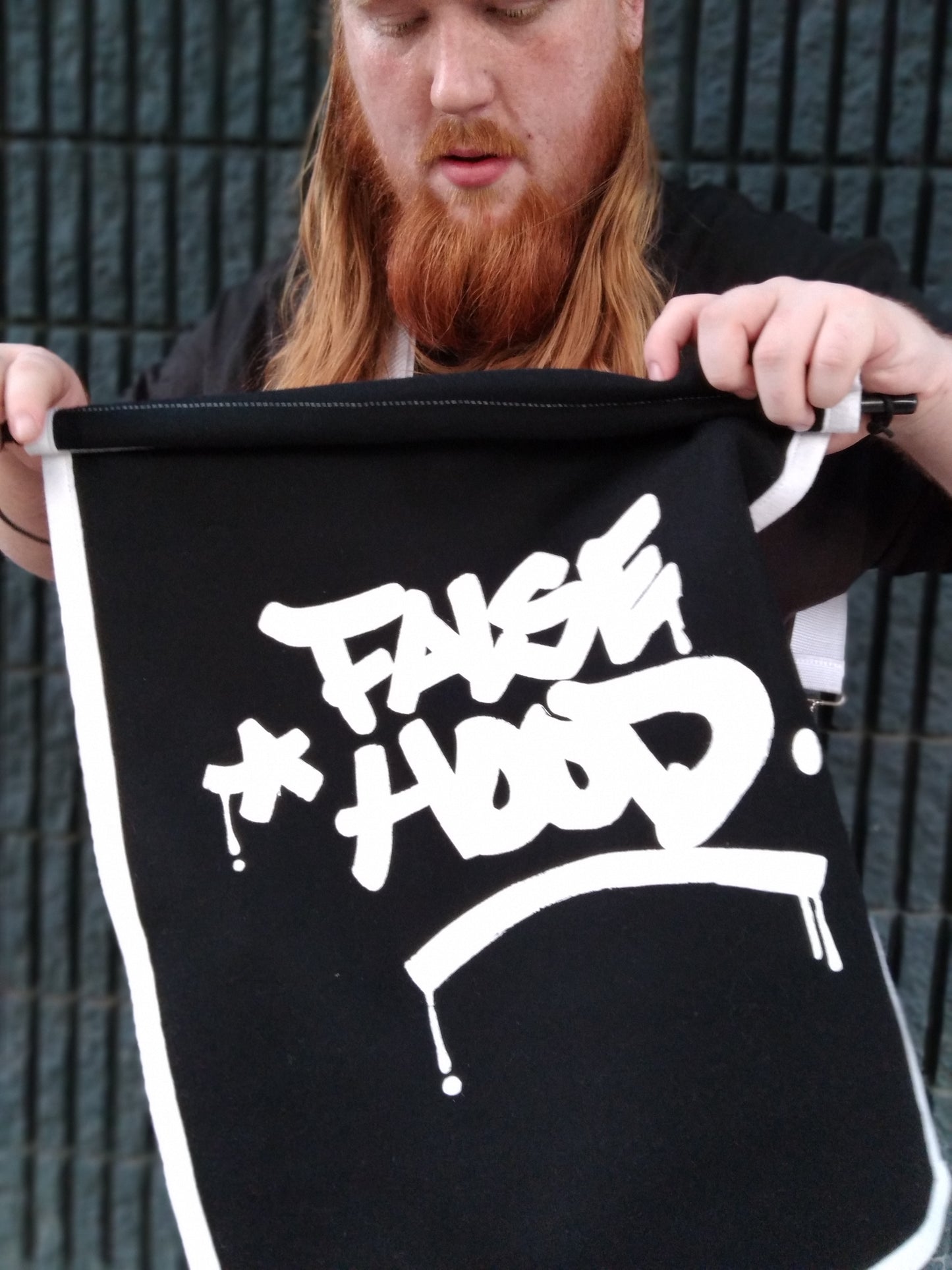The Big TAG. Banner - FALSEHOOD.