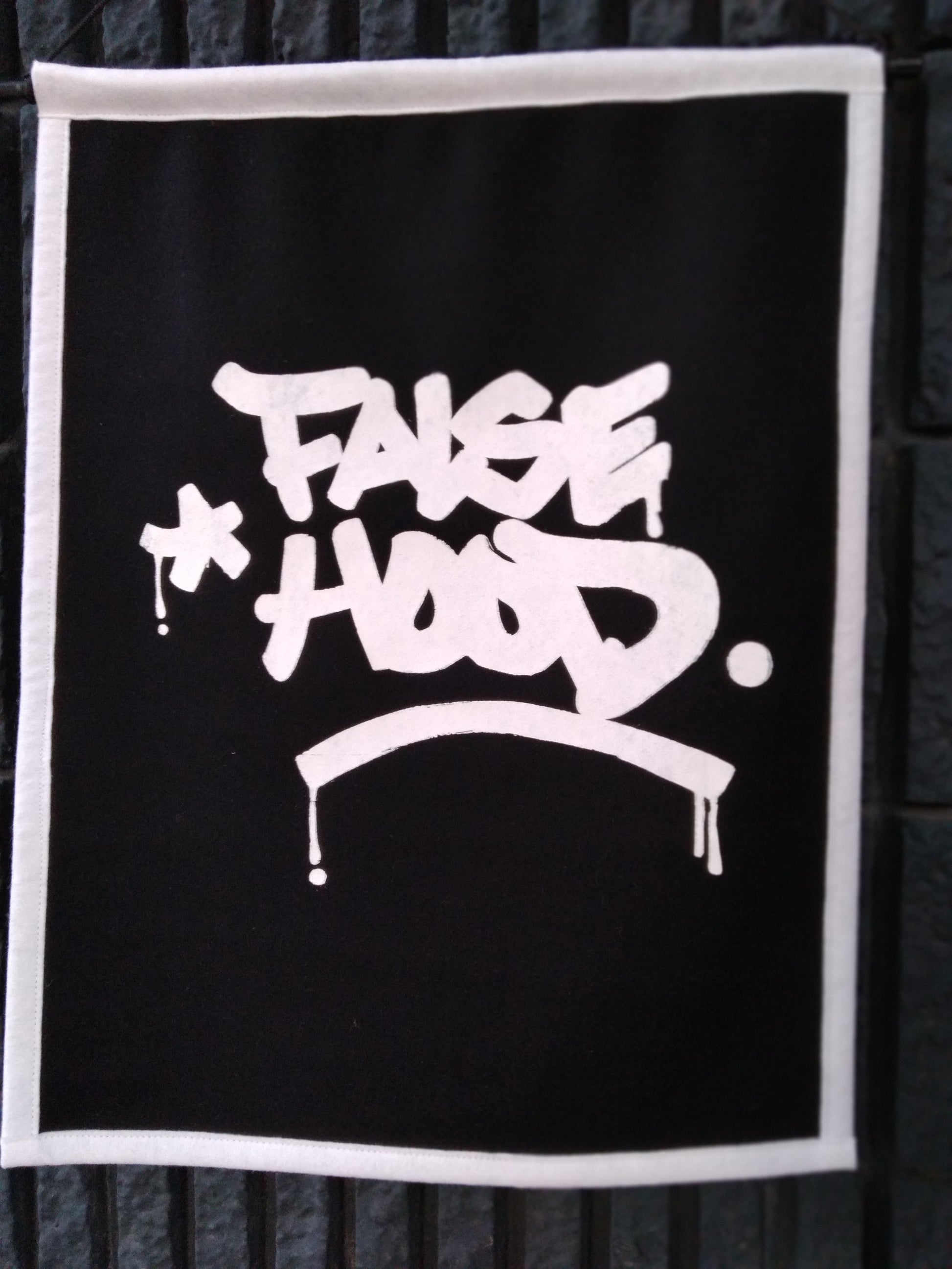 The Big TAG. Banner - FALSEHOOD.