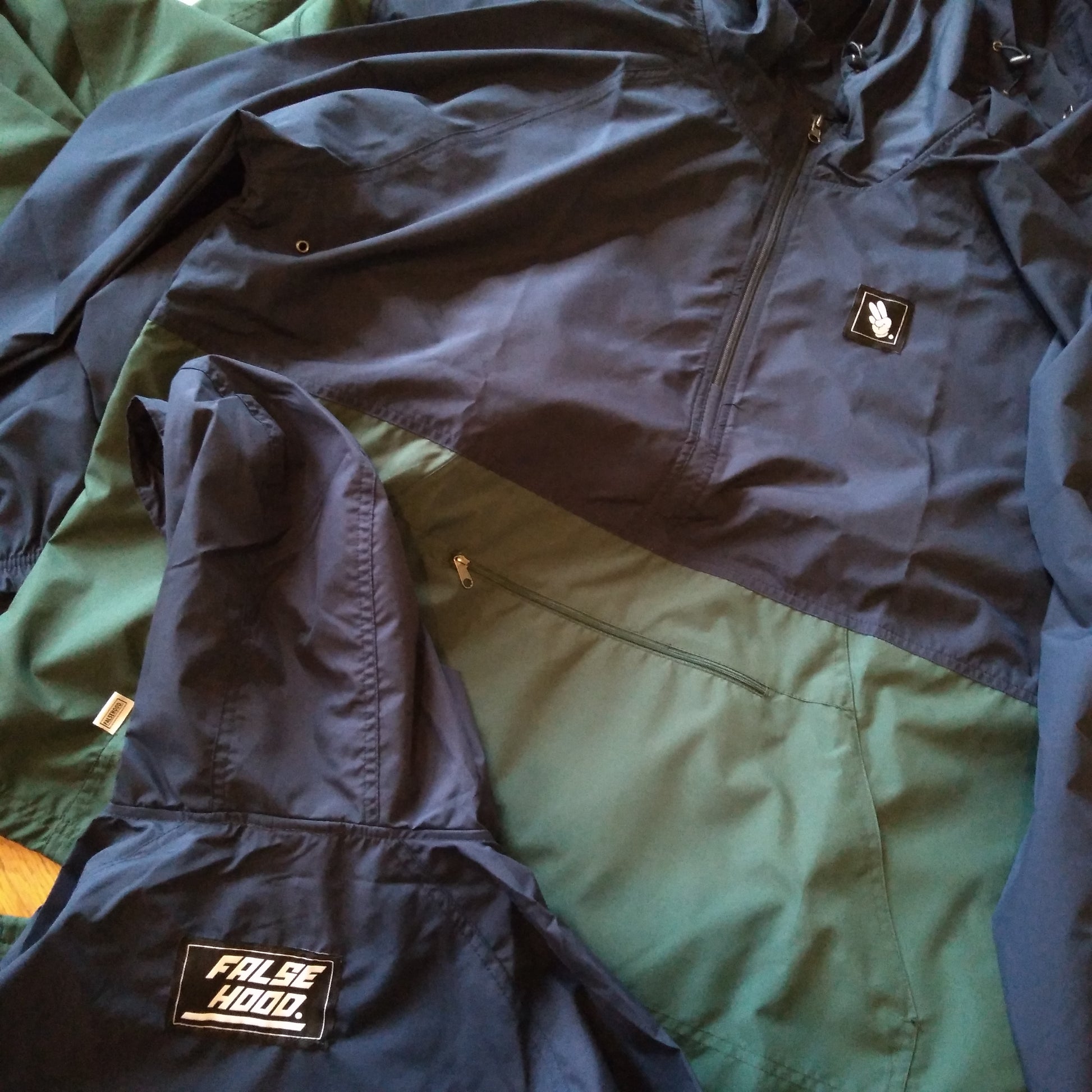 FINGERS TOGETHER. Quarter-Zip Pullover Windbreaker - FALSEHOOD.