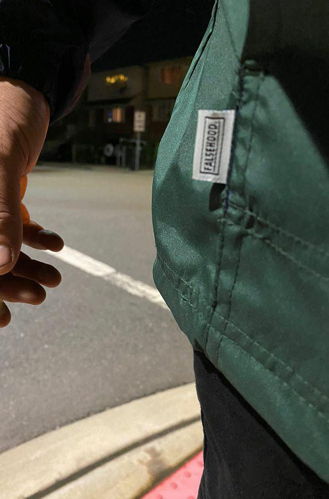 FINGERS TOGETHER. Quarter-Zip Pullover Windbreaker - FALSEHOOD.