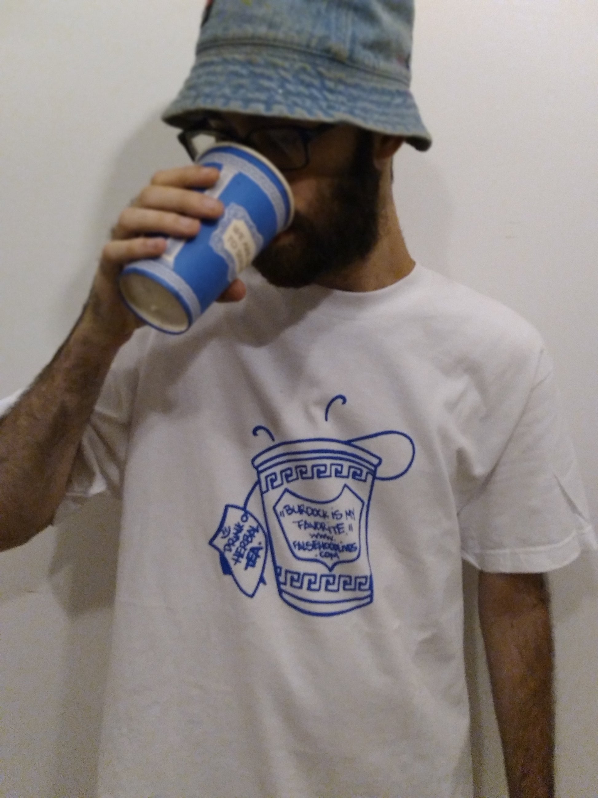 The TEA CUP. Tee - FALSEHOOD.