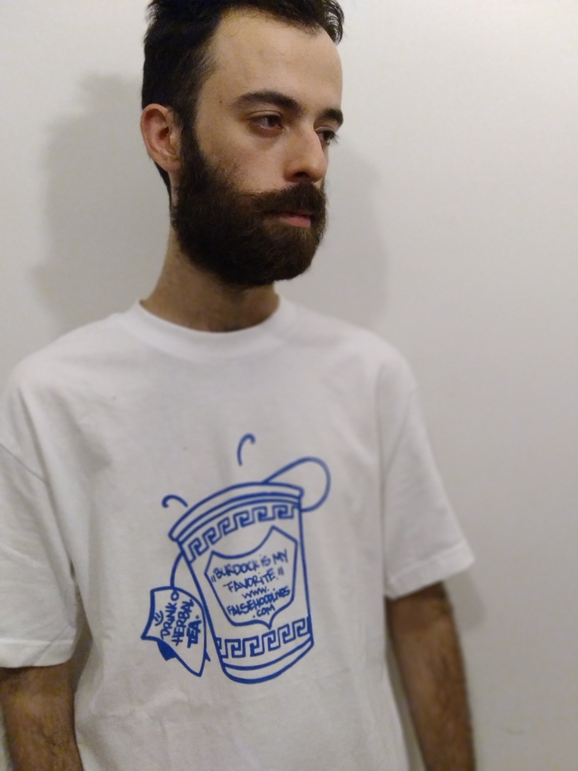 The TEA CUP. Tee - FALSEHOOD.