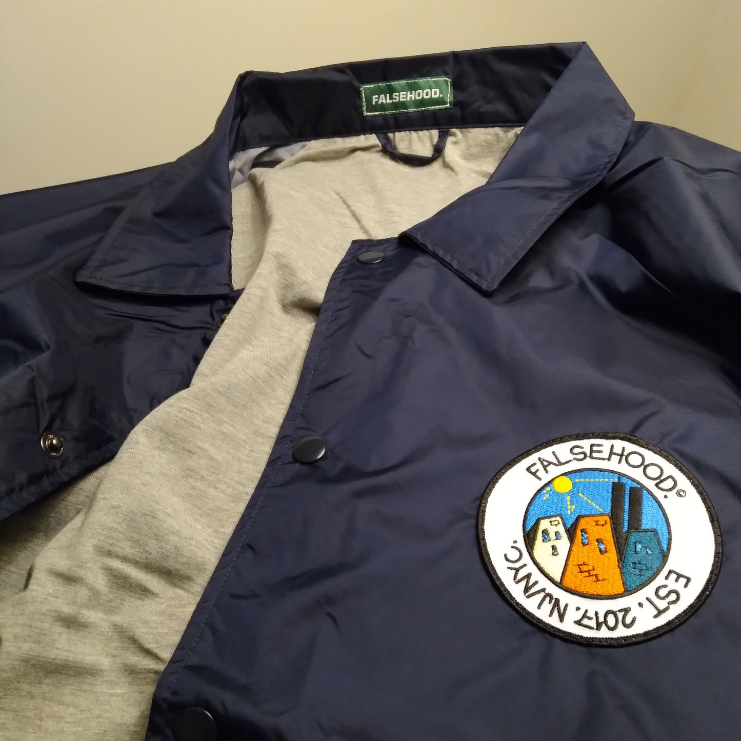 The SUNNY. Coach Jacket - FALSEHOOD.