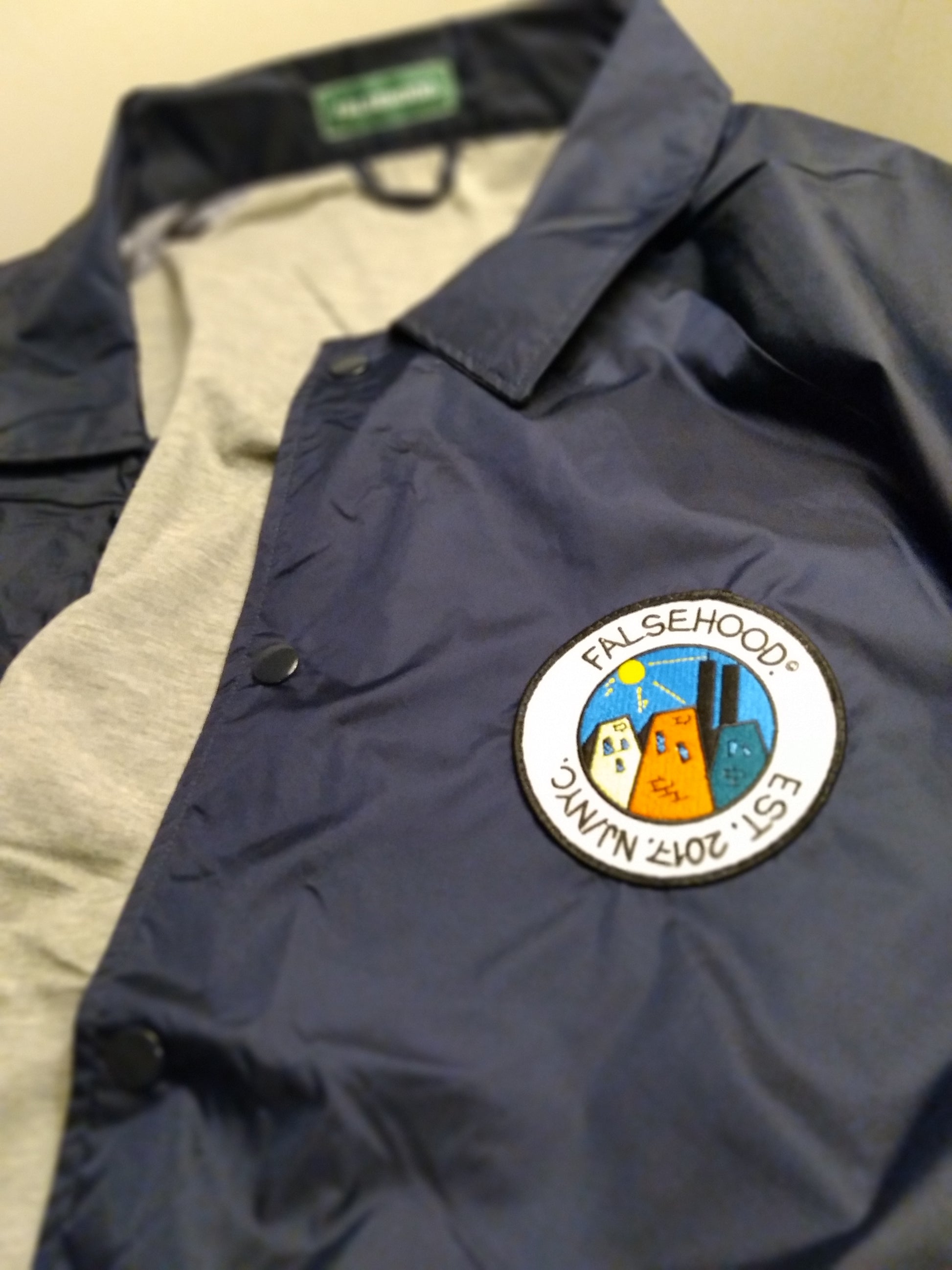 The SUNNY. Coach Jacket - FALSEHOOD.