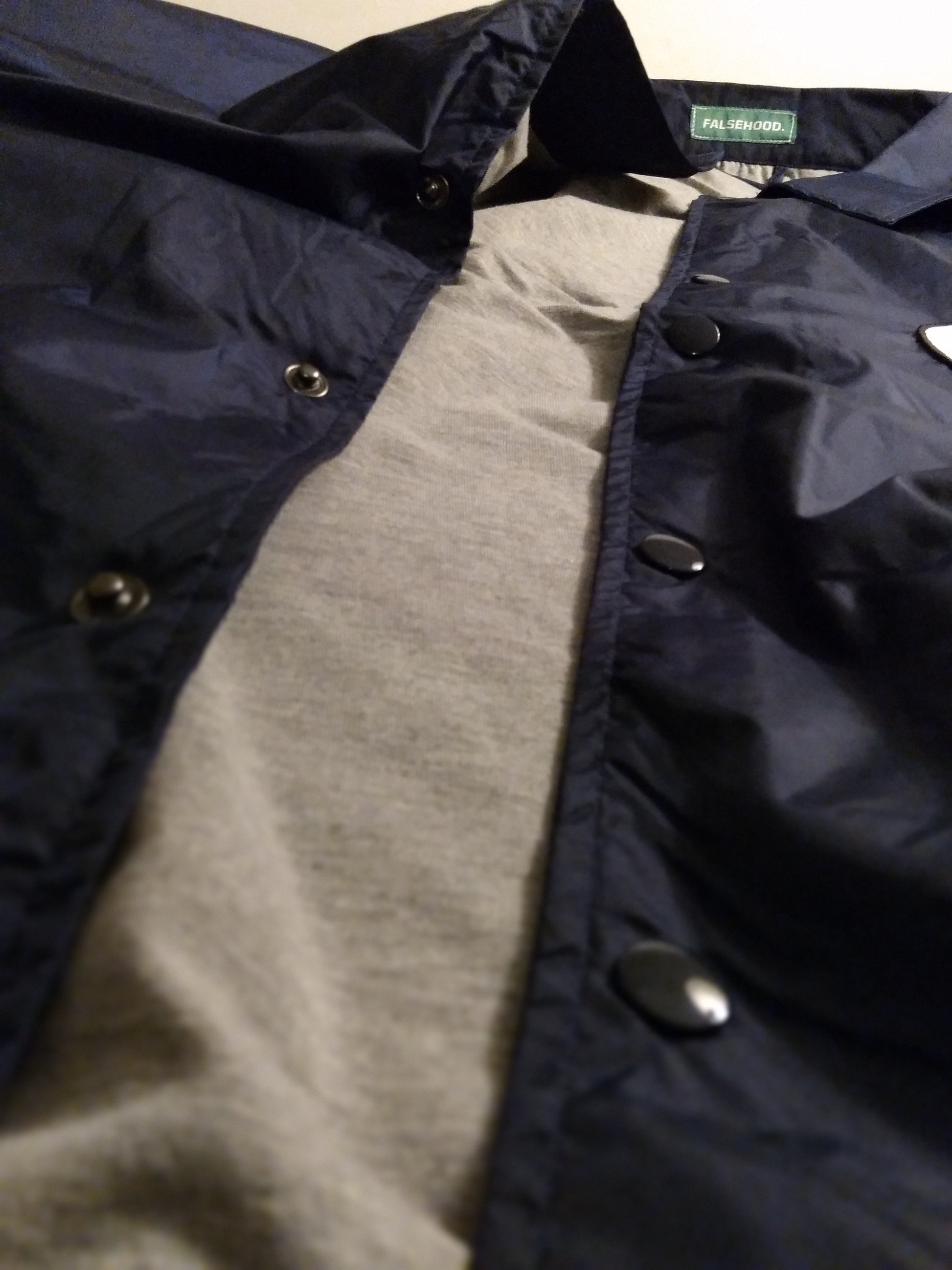 The SUNNY. Coach Jacket - FALSEHOOD.