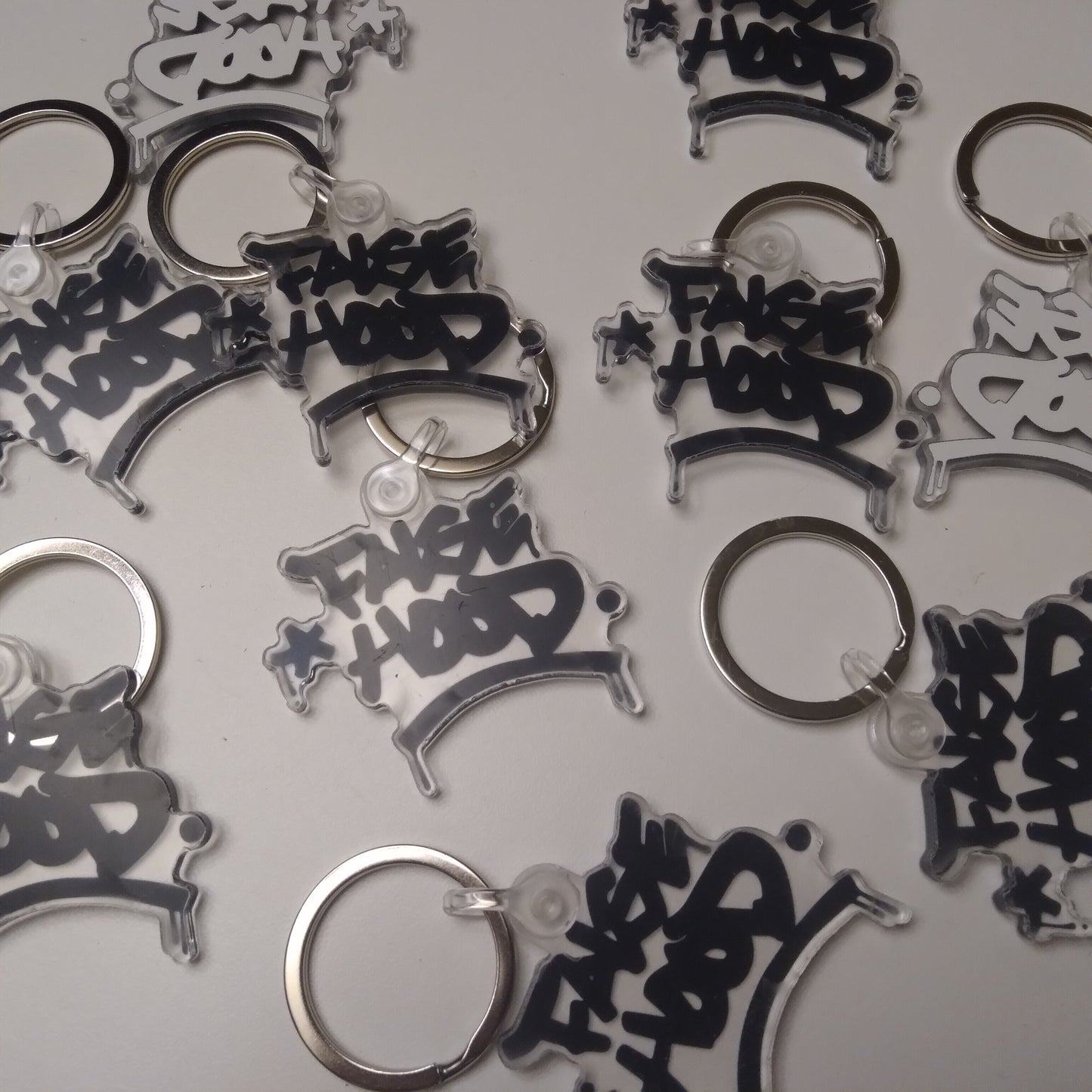 Big TAG. Key Chain - FALSEHOOD.