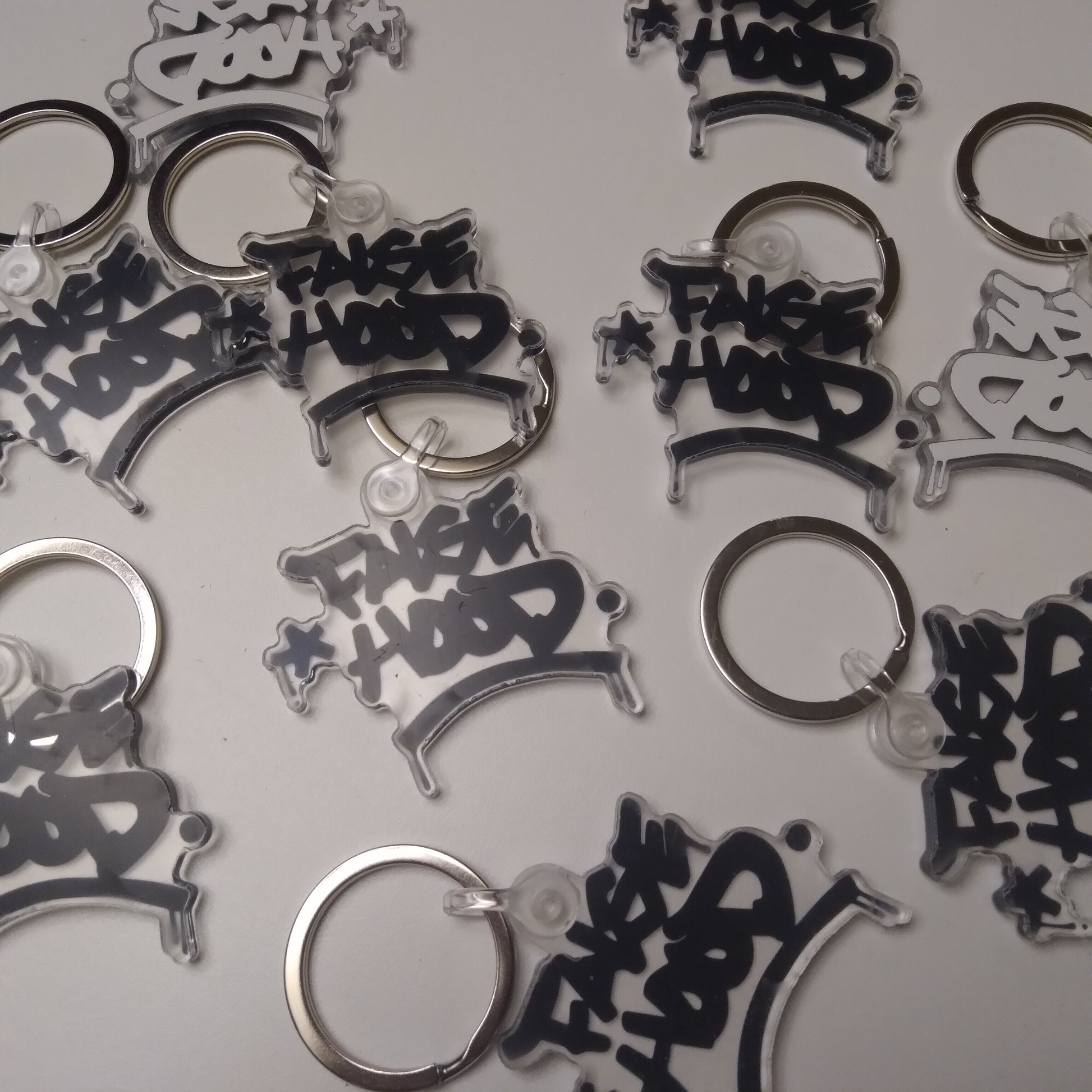 Big TAG. Key Chain - FALSEHOOD.