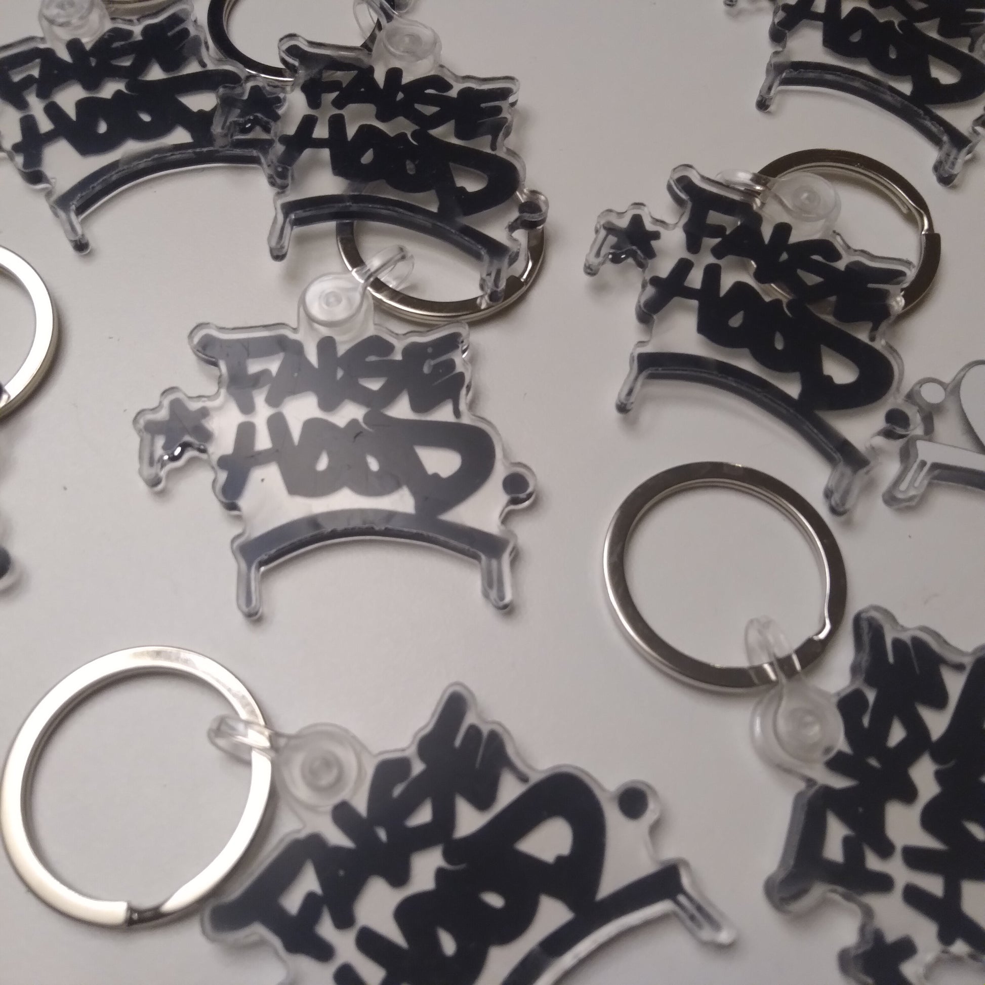 Big TAG. Key Chain - FALSEHOOD.