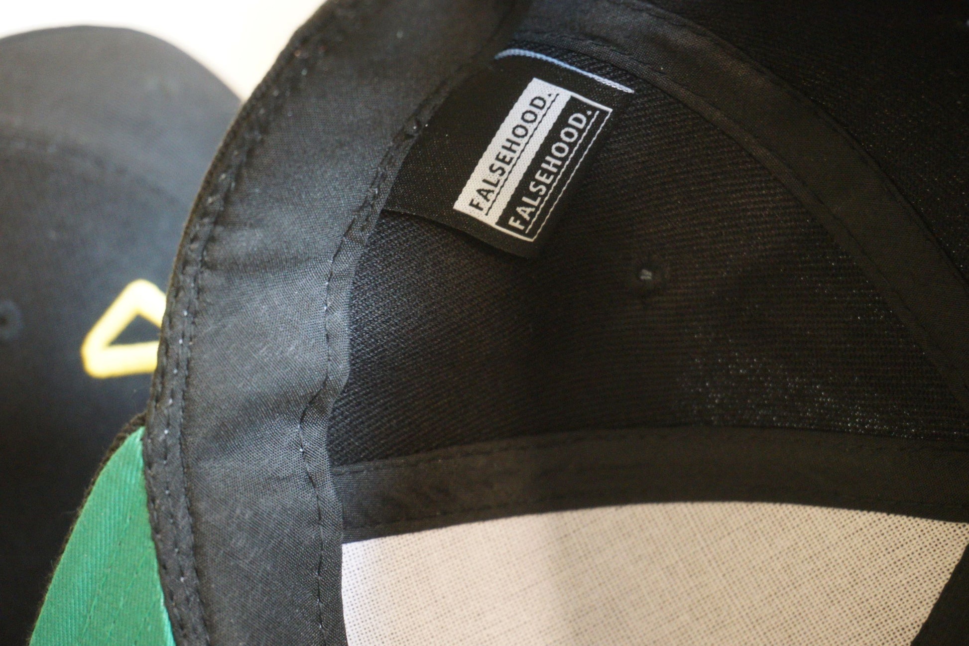 GWC - BATES Snapback Cap - FALSEHOOD.