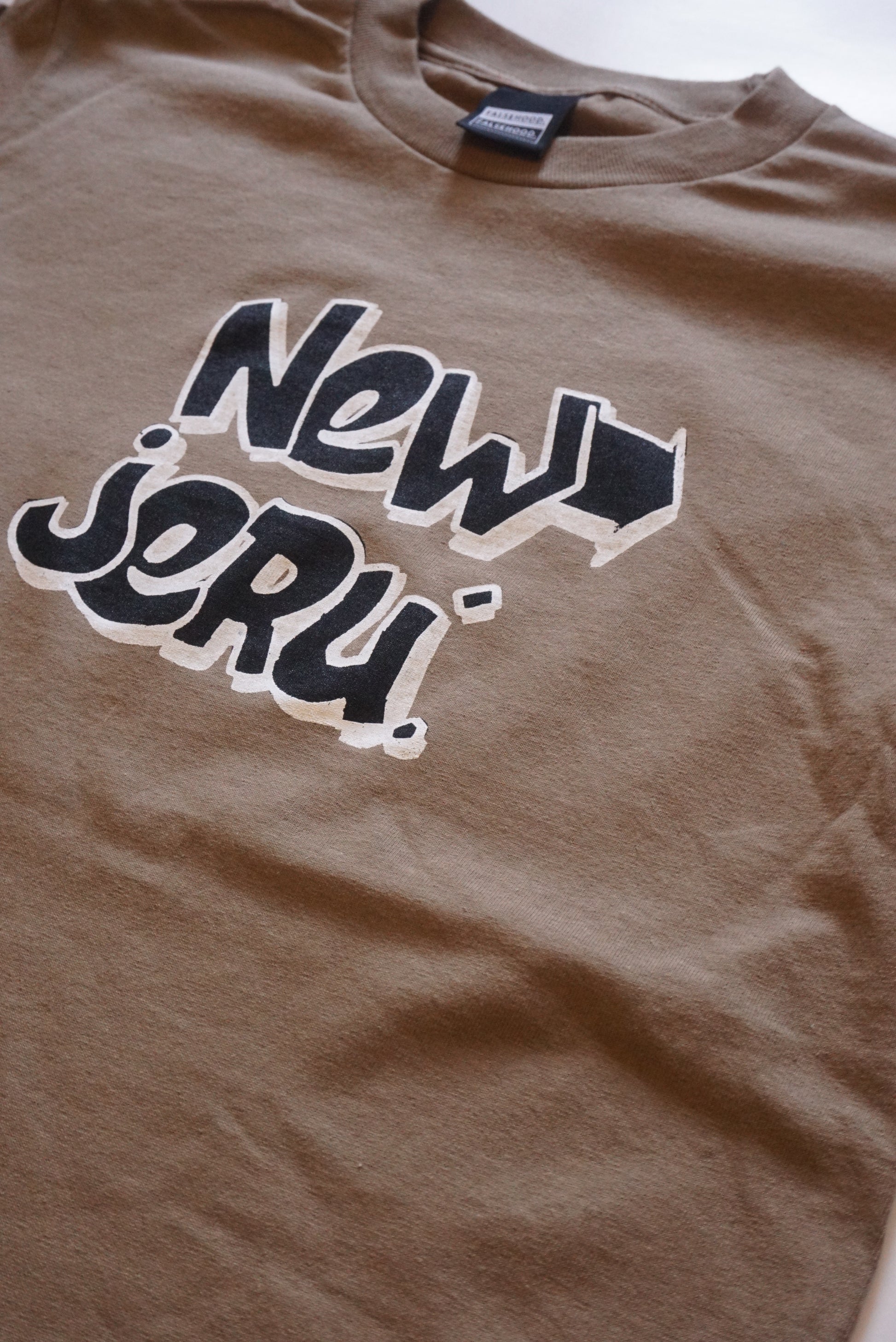 NEW JERU' THROWIE. Tee - FALSEHOOD.