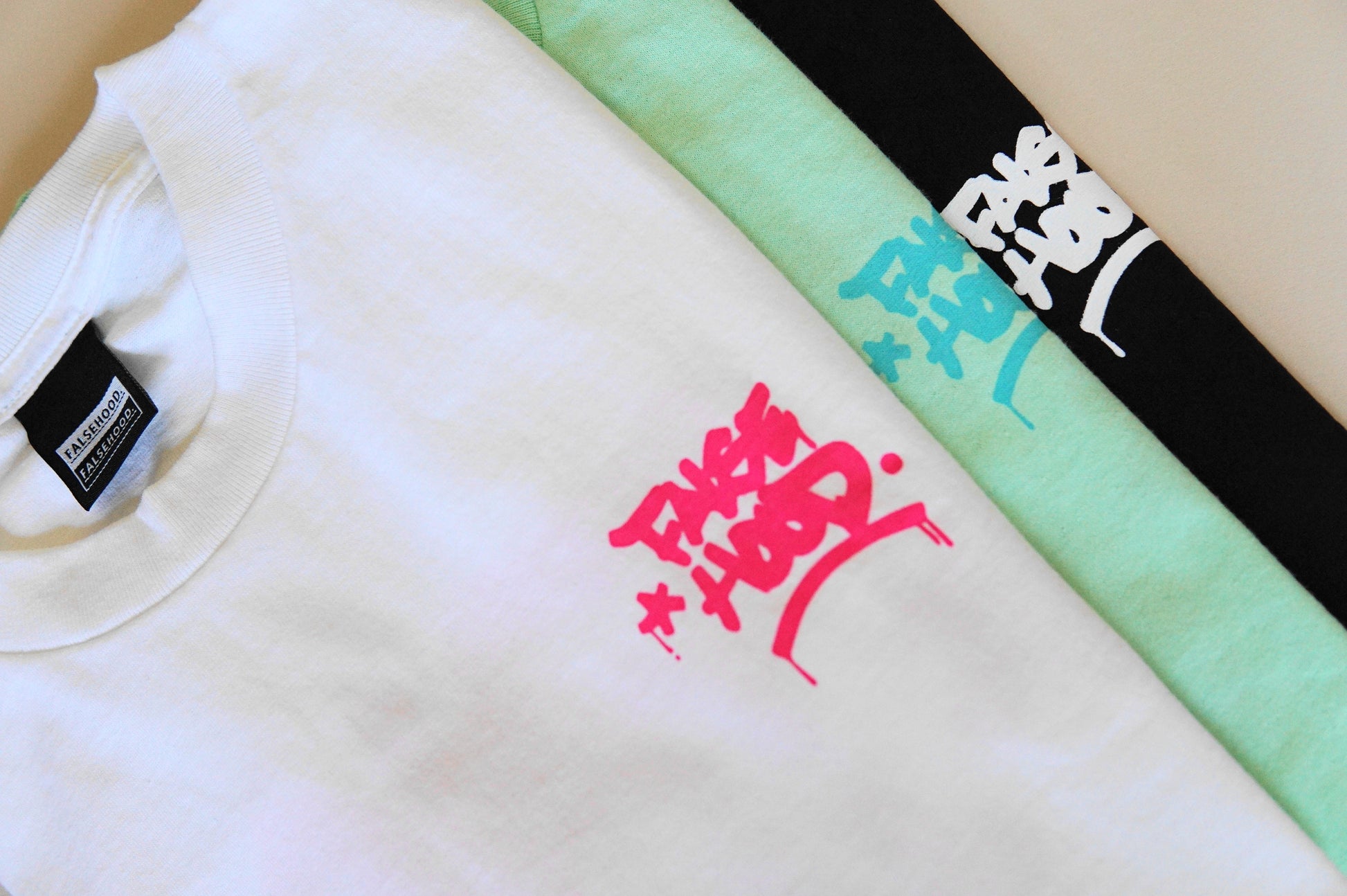 The Big TAG. Tee - FALSEHOOD.