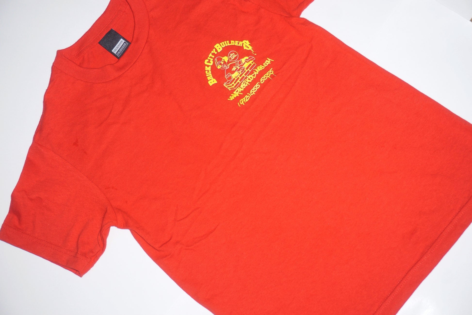 BRICK CITY BUILDERS Tee - FALSEHOOD.