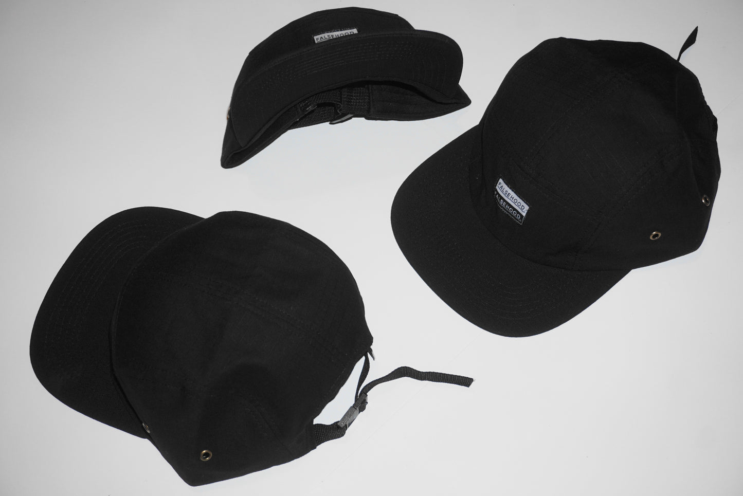 BOX LOGO. Camper Cap - FALSEHOOD.