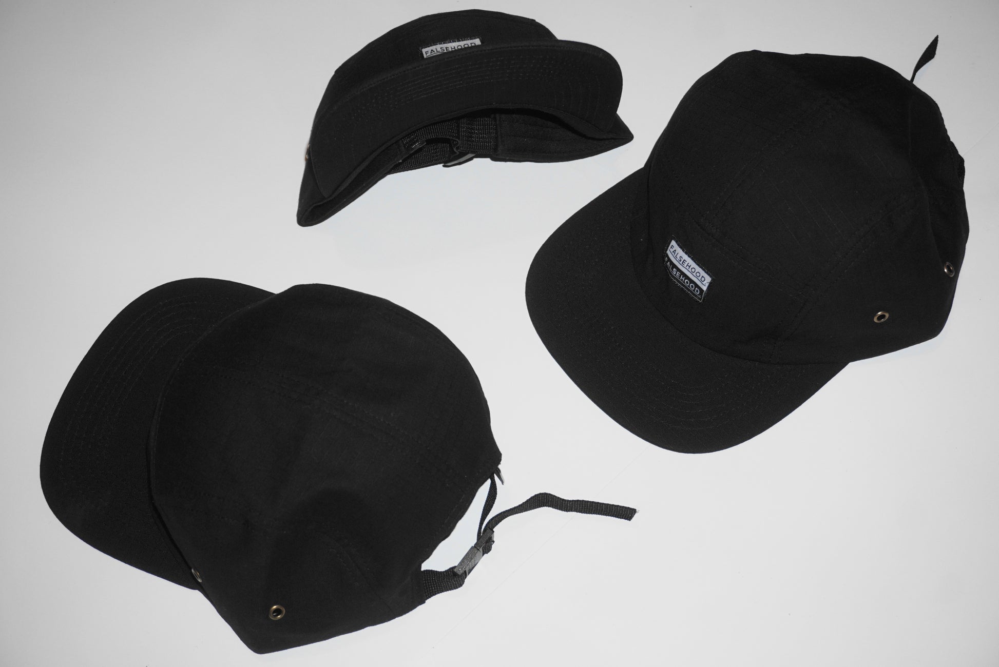 BOX LOGO. Camper Cap - FALSEHOOD.