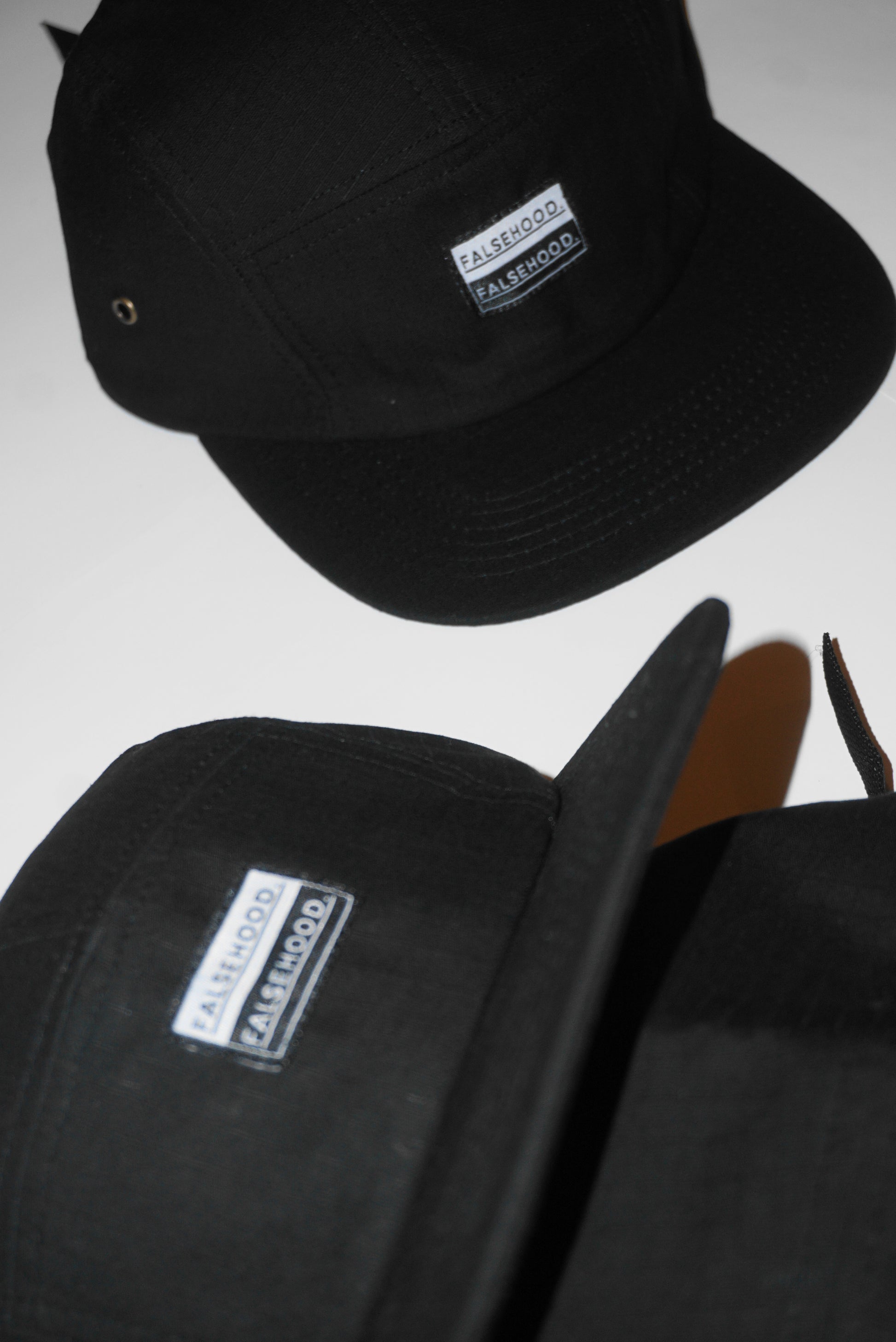 BOX LOGO. Camper Cap - FALSEHOOD.