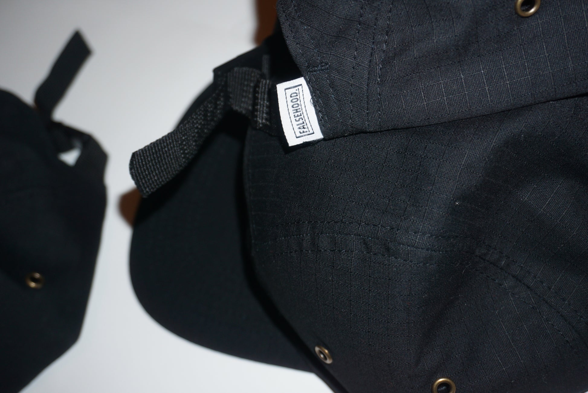 BOX LOGO. Camper Cap - FALSEHOOD.