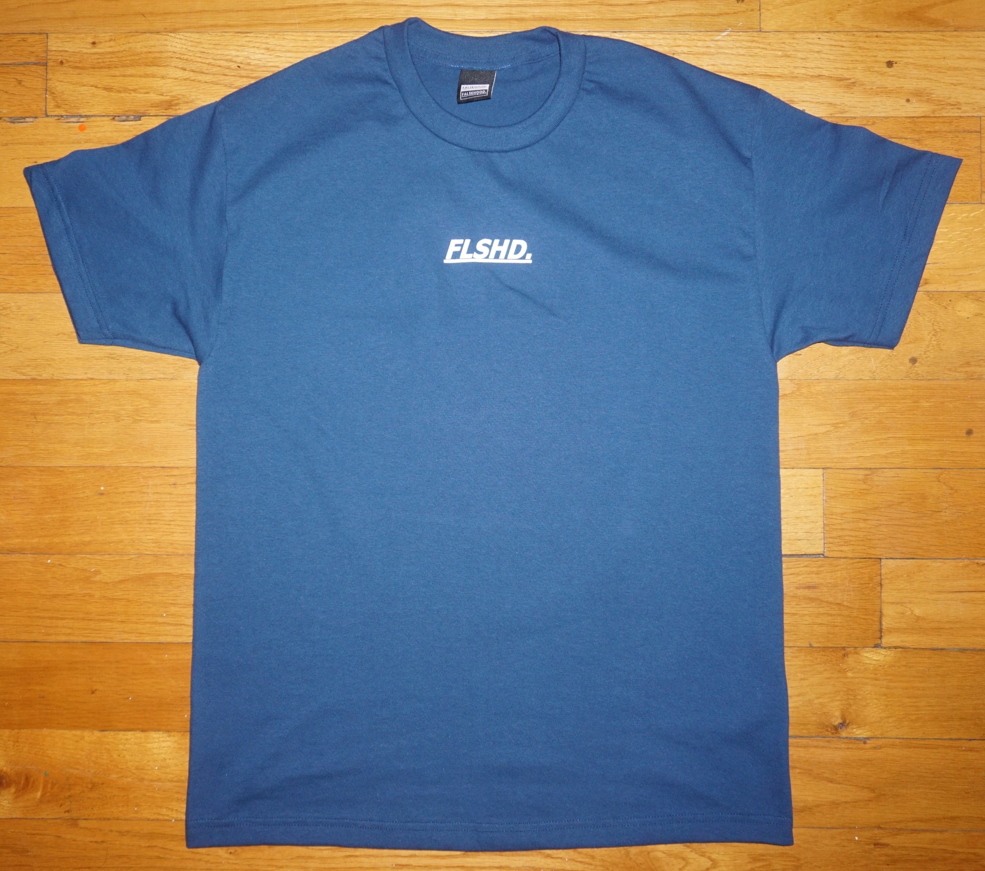 SNAKES. Tee - FALSEHOOD.