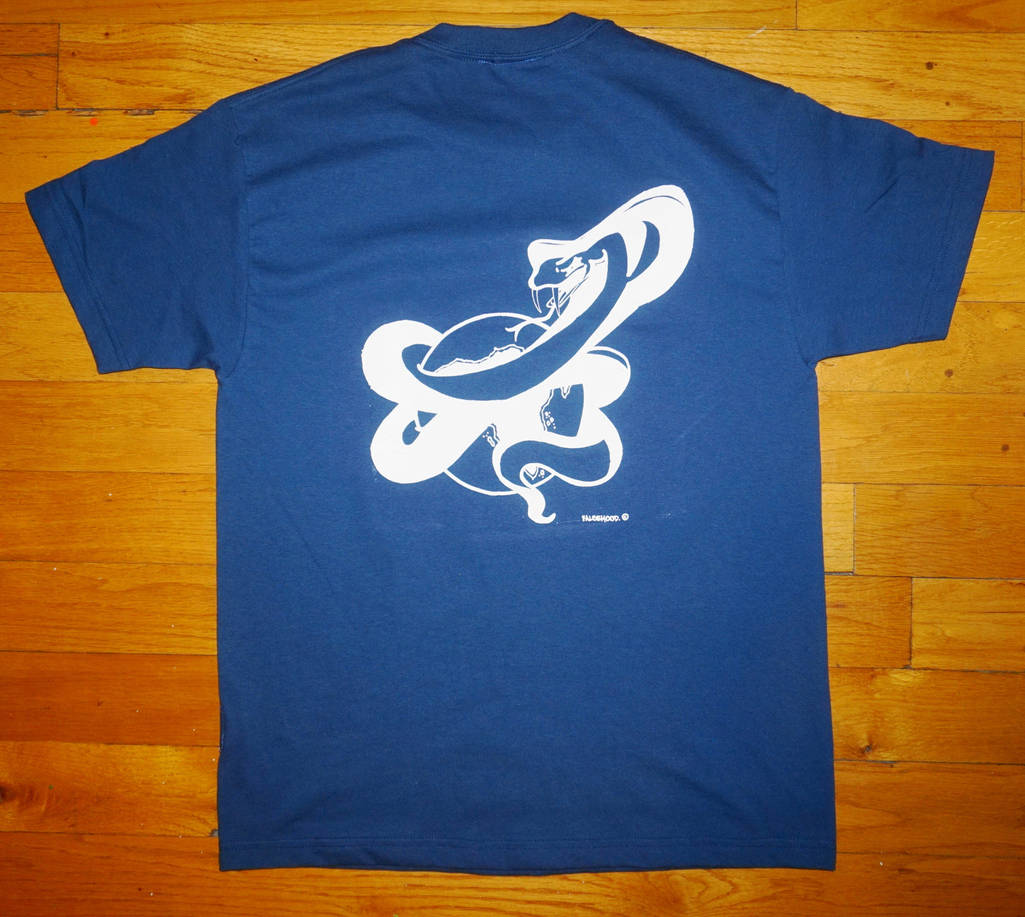 SNAKES. Tee - FALSEHOOD.