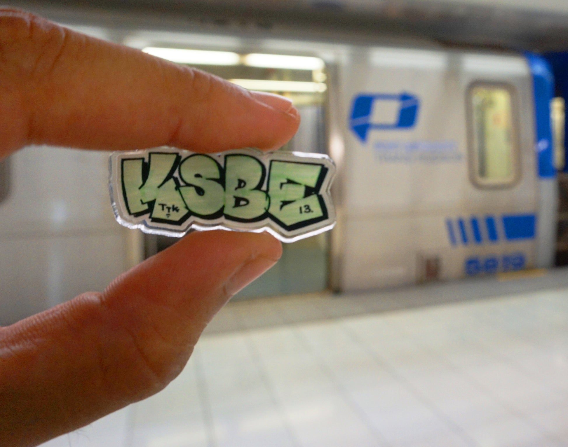 KSBE 13 & FALSEHOOD. THROWIE Acrylic Pins - FALSEHOOD.