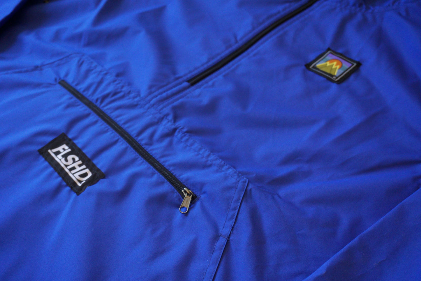 FAMILY. Quarter-Zip Pullover Windbreaker - FALSEHOOD.