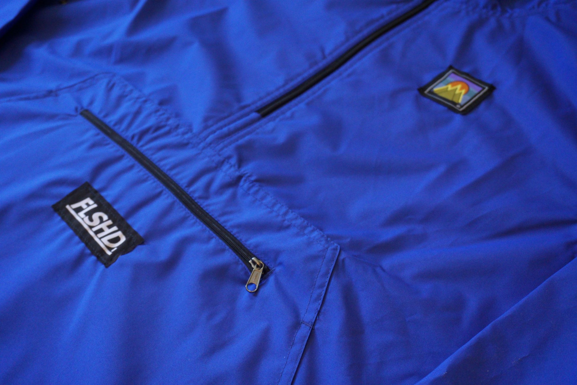 FAMILY. Quarter-Zip Pullover Windbreaker - FALSEHOOD.