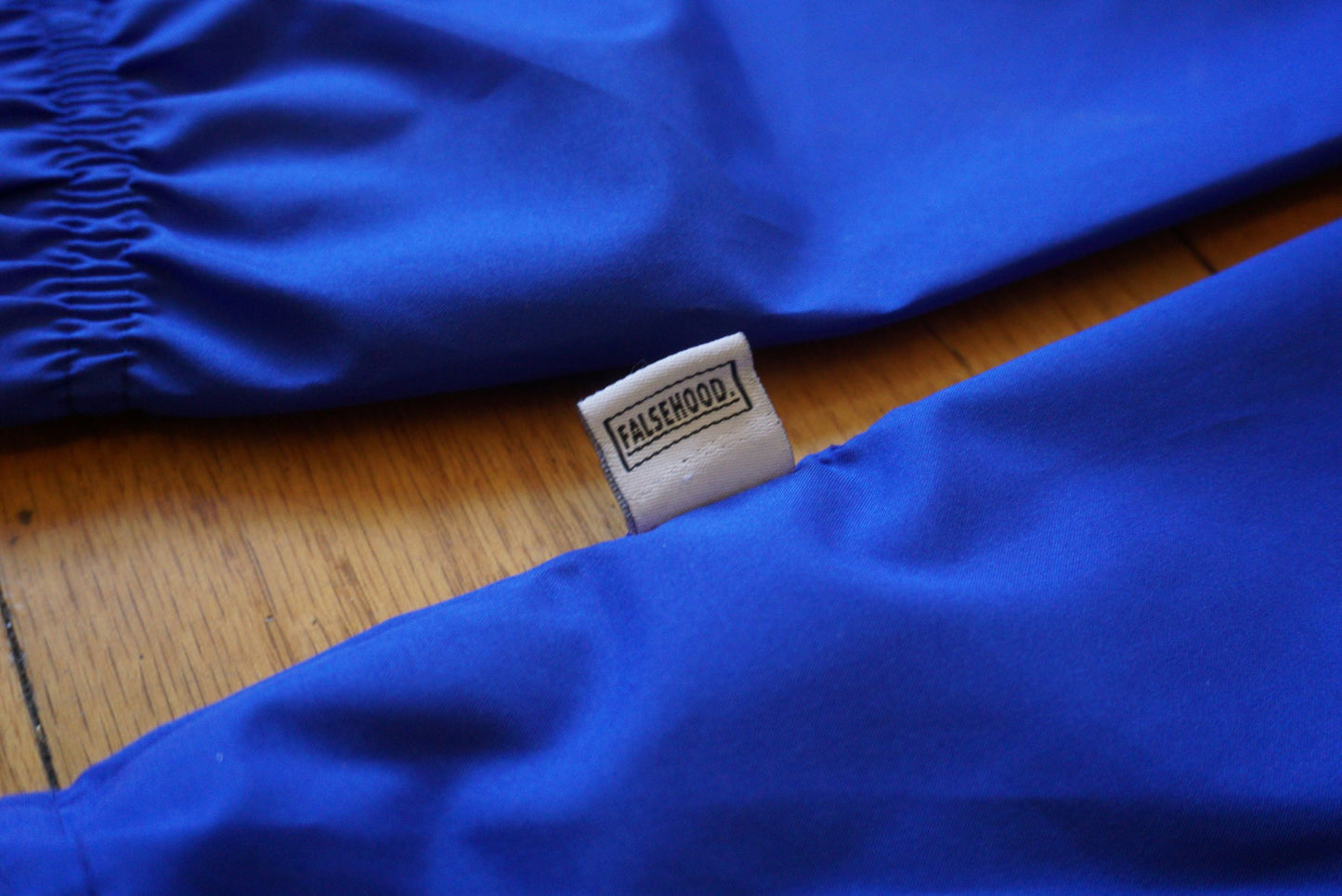 FAMILY. Quarter-Zip Pullover Windbreaker - FALSEHOOD.