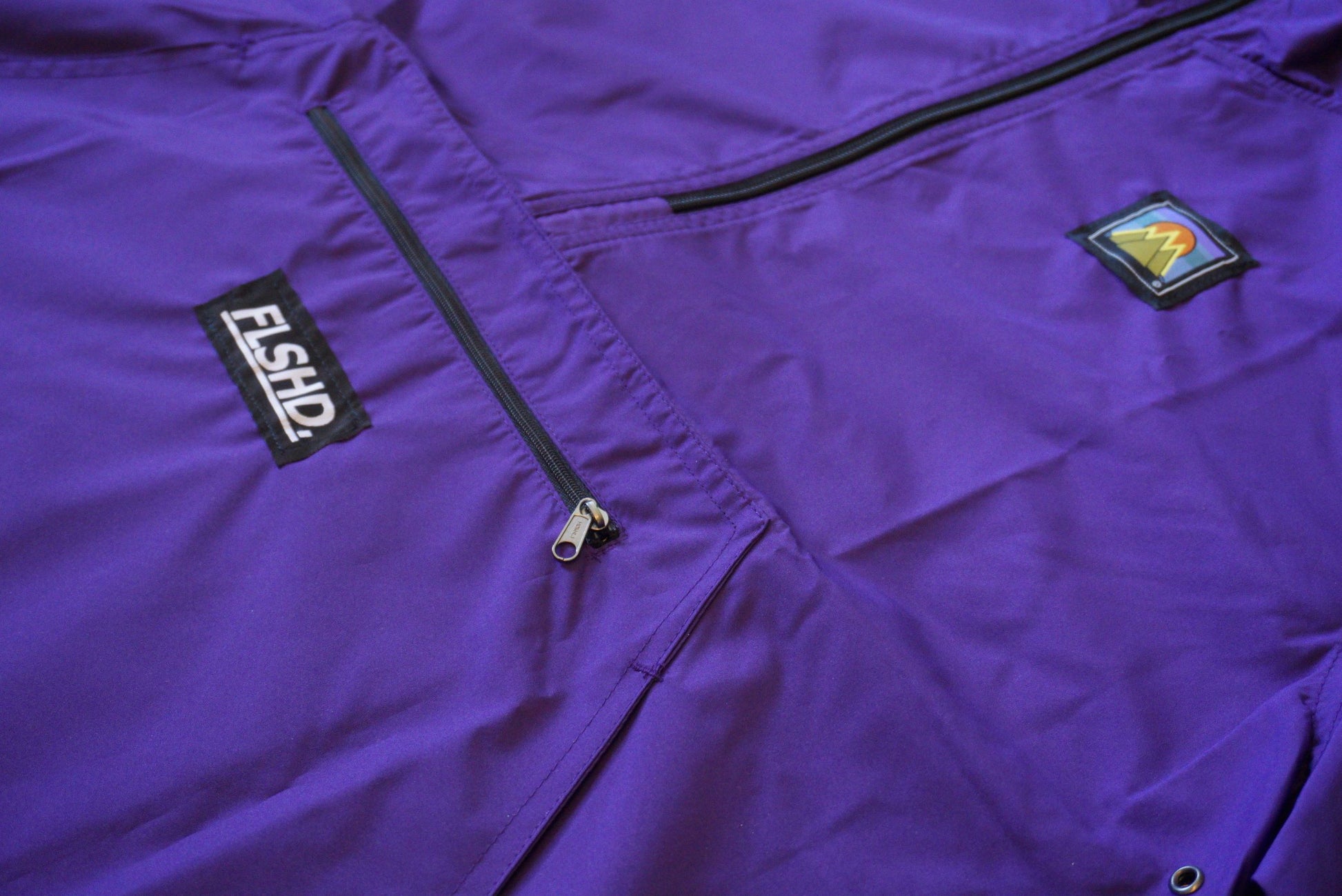 FAMILY. Quarter-Zip Pullover Windbreaker - FALSEHOOD.