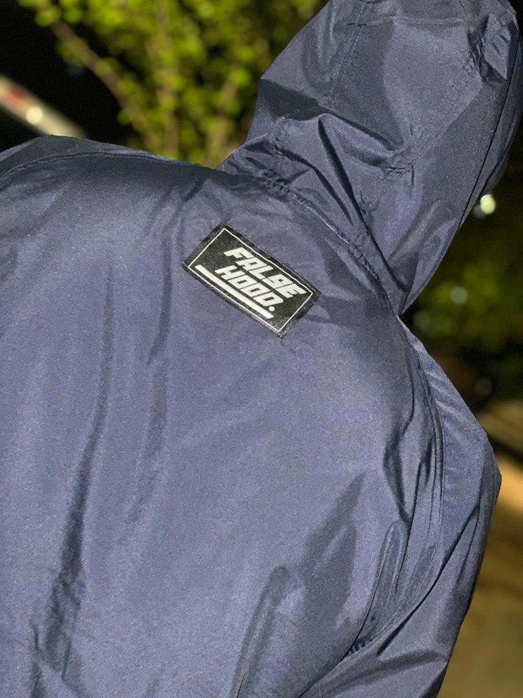 FINGERS TOGETHER. Quarter-Zip Pullover Windbreaker - FALSEHOOD.