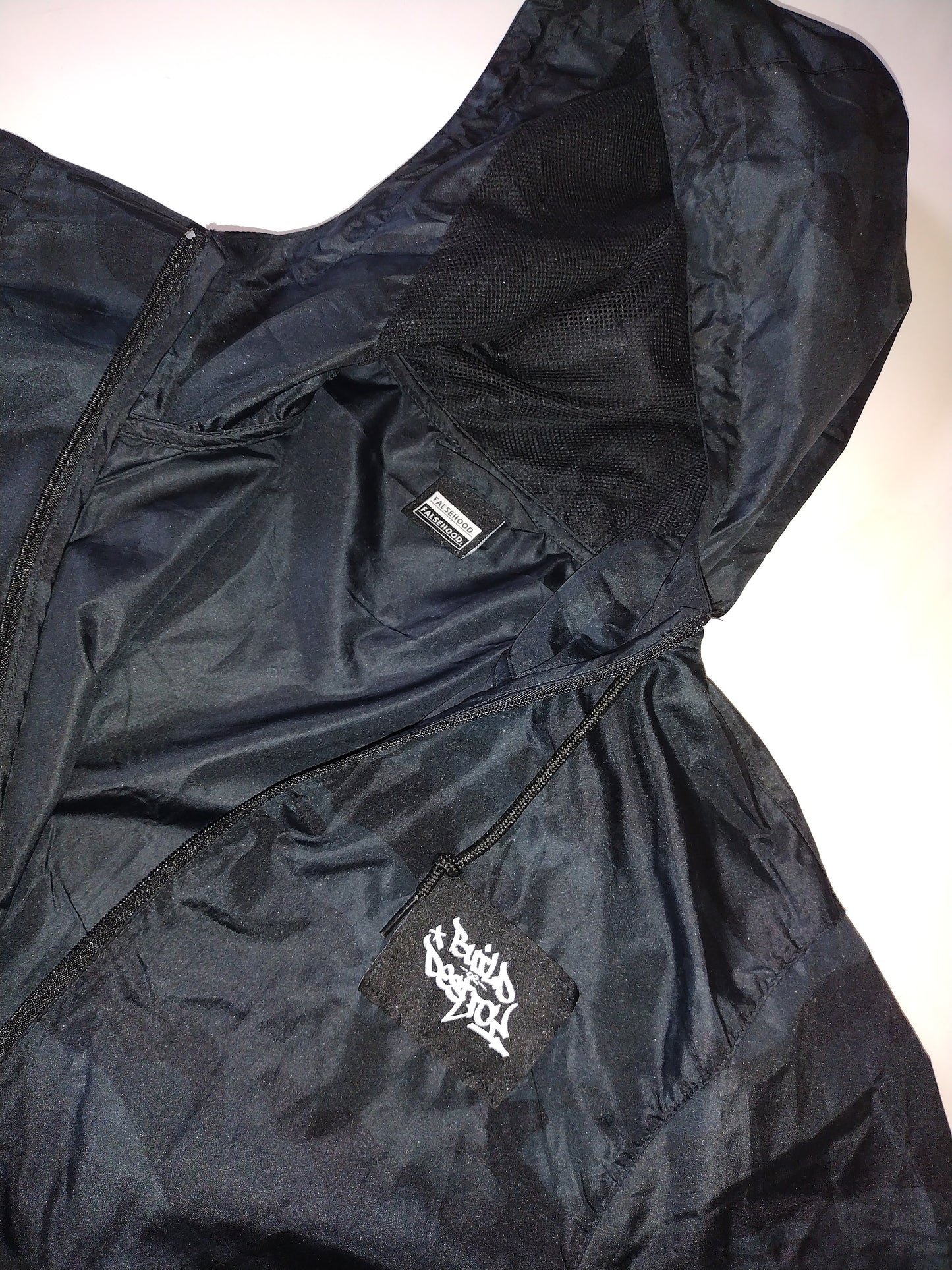 BUILD or DESTROY. Full-Zip Windbreaker Jacket - FALSEHOOD.