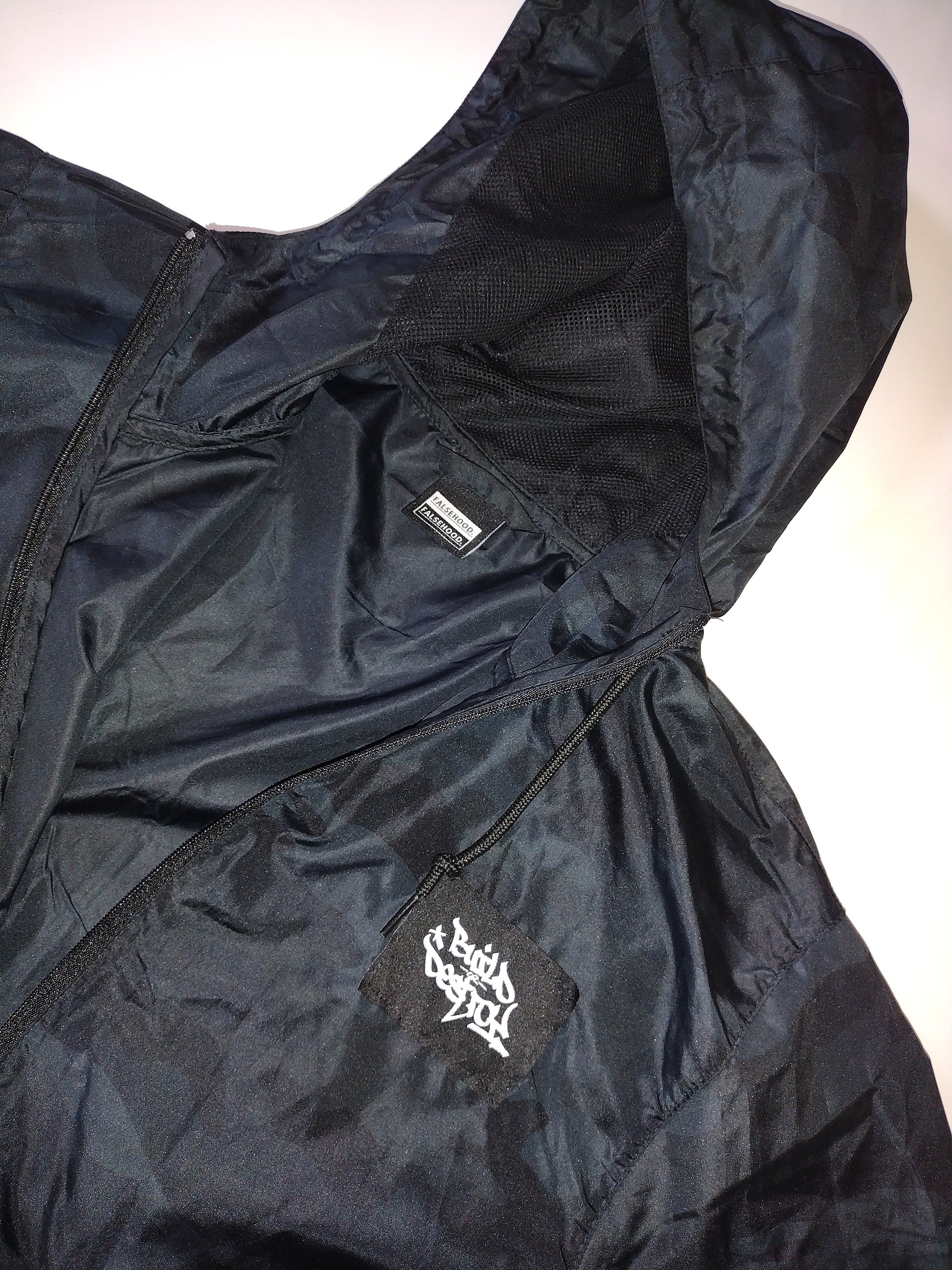 BUILD or DESTROY. Full-Zip Windbreaker Jacket - FALSEHOOD.