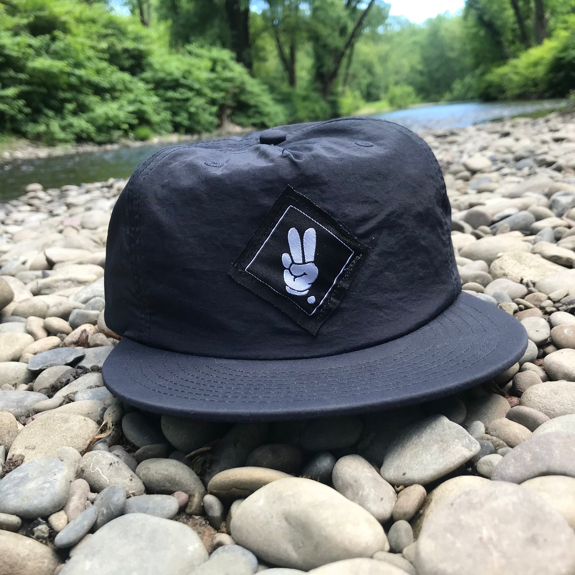 FINGERS TOGETHER. Snapback Cap - FALSEHOOD.