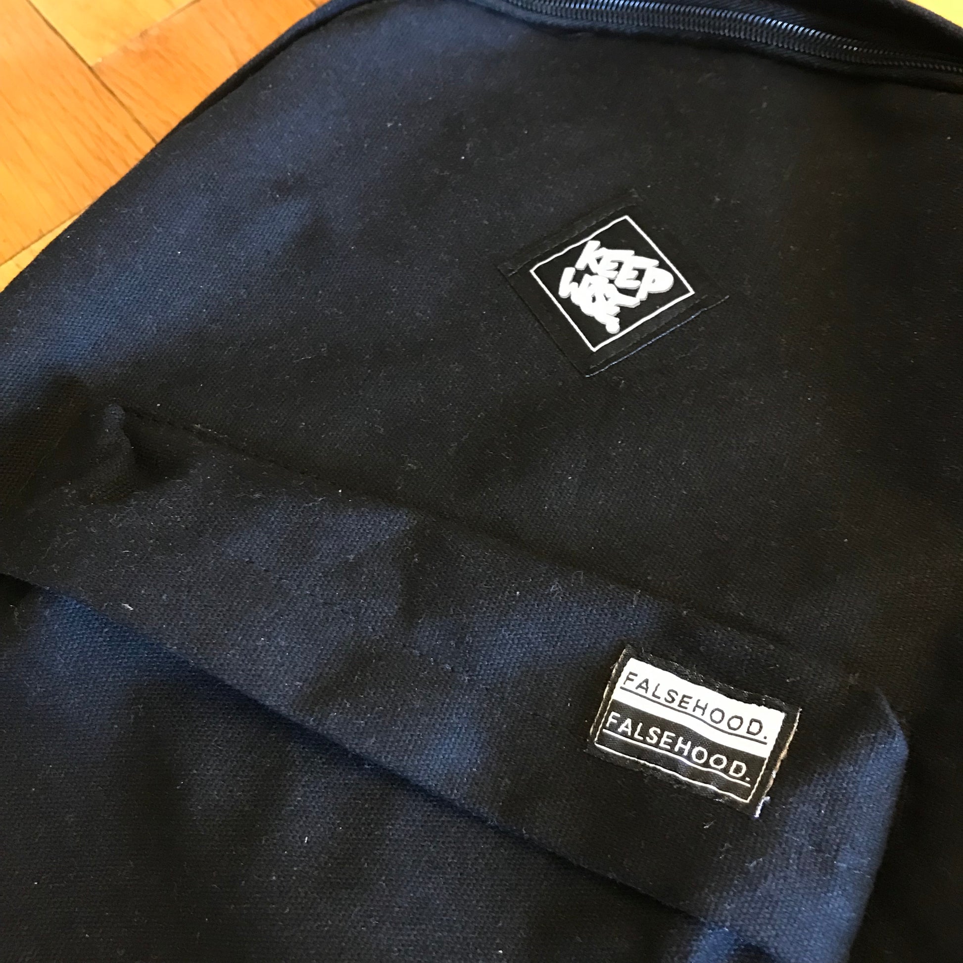 KEEP WISE. Backpack - FALSEHOOD.