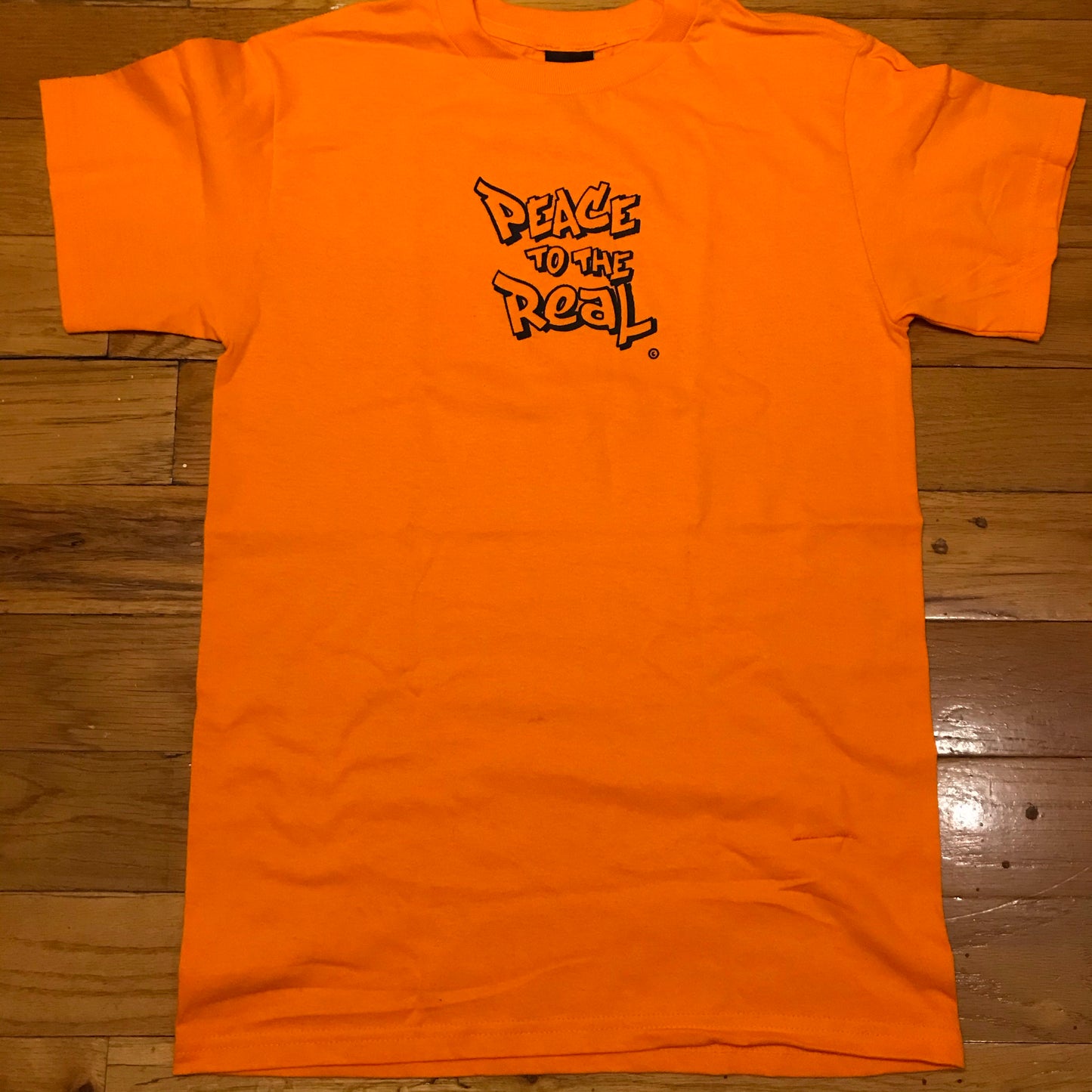 PEACE TO THE REAL. © Tee - FALSEHOOD.