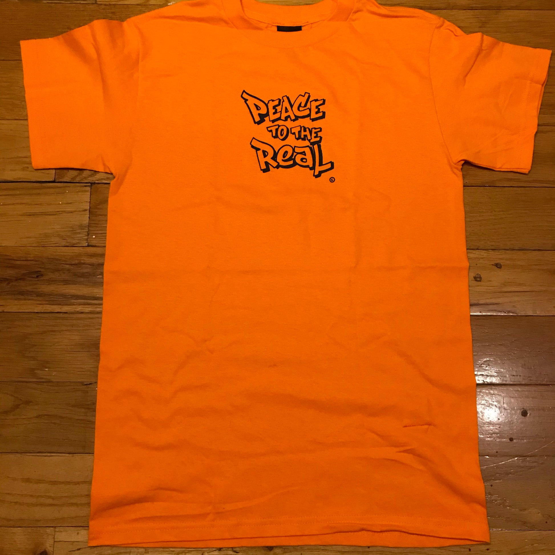 PEACE TO THE REAL. © Tee - FALSEHOOD.