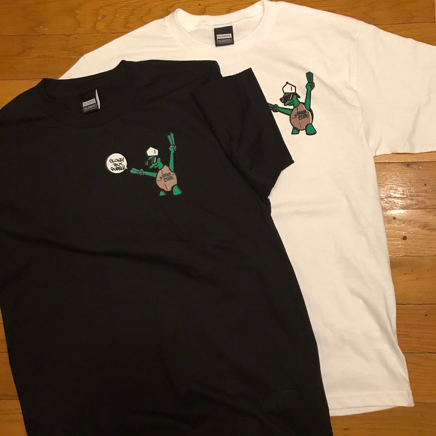 LEO The Turtle. Tee - FALSEHOOD.