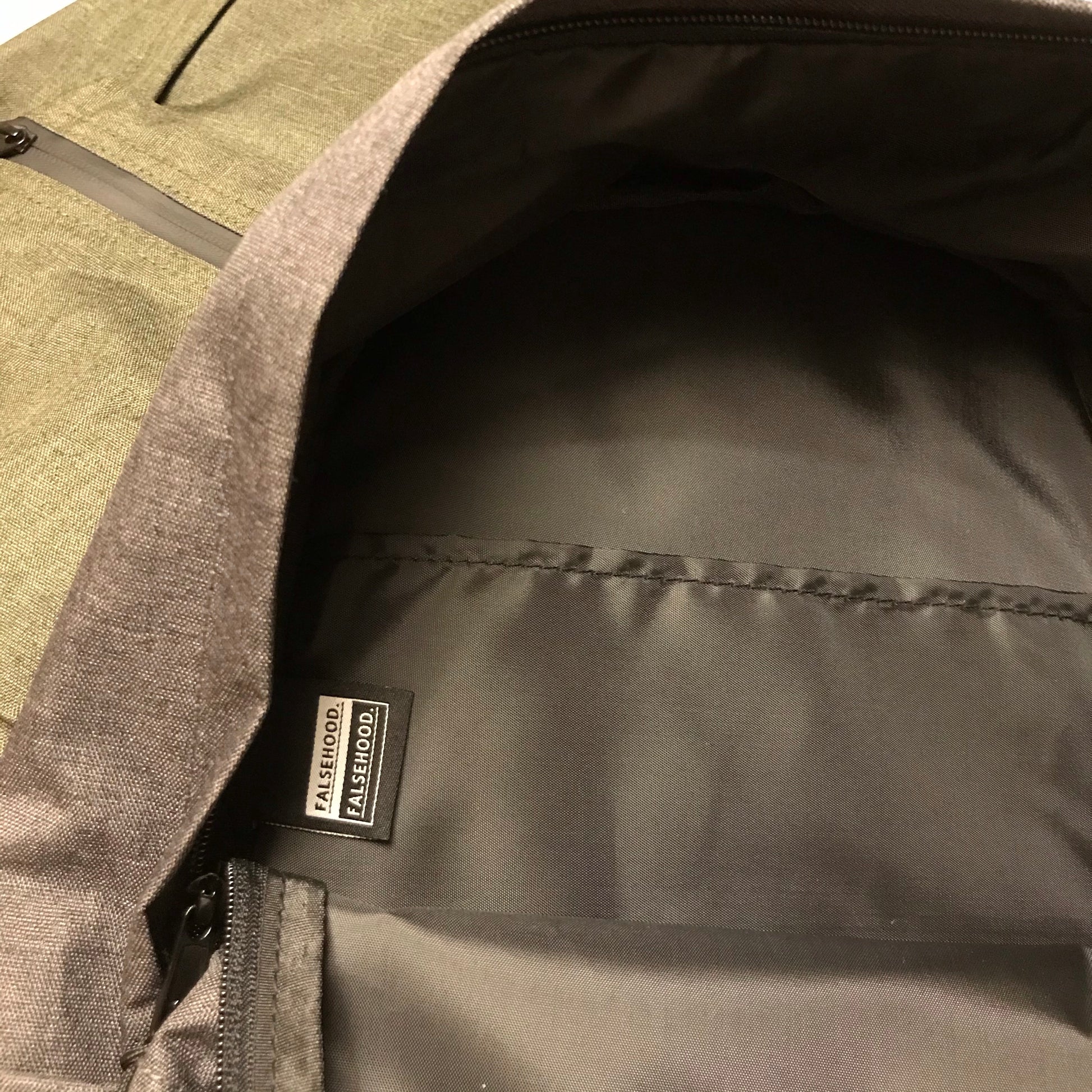 FINGERS TOGETHER. Backpack - FALSEHOOD.