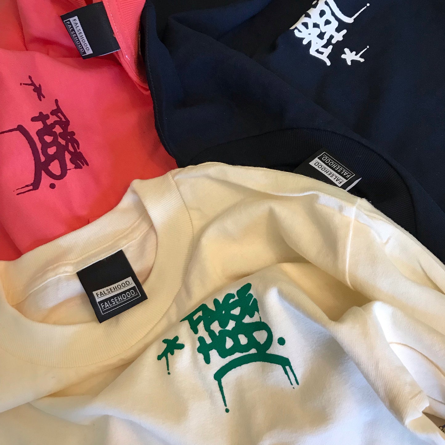 The TAG. Tee - FALSEHOOD.