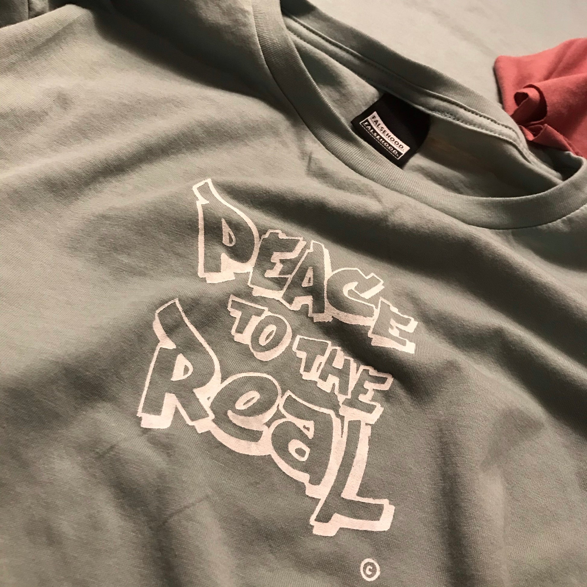 WMNS - PEACE TO THE REAL. © Crop Tee - FALSEHOOD.