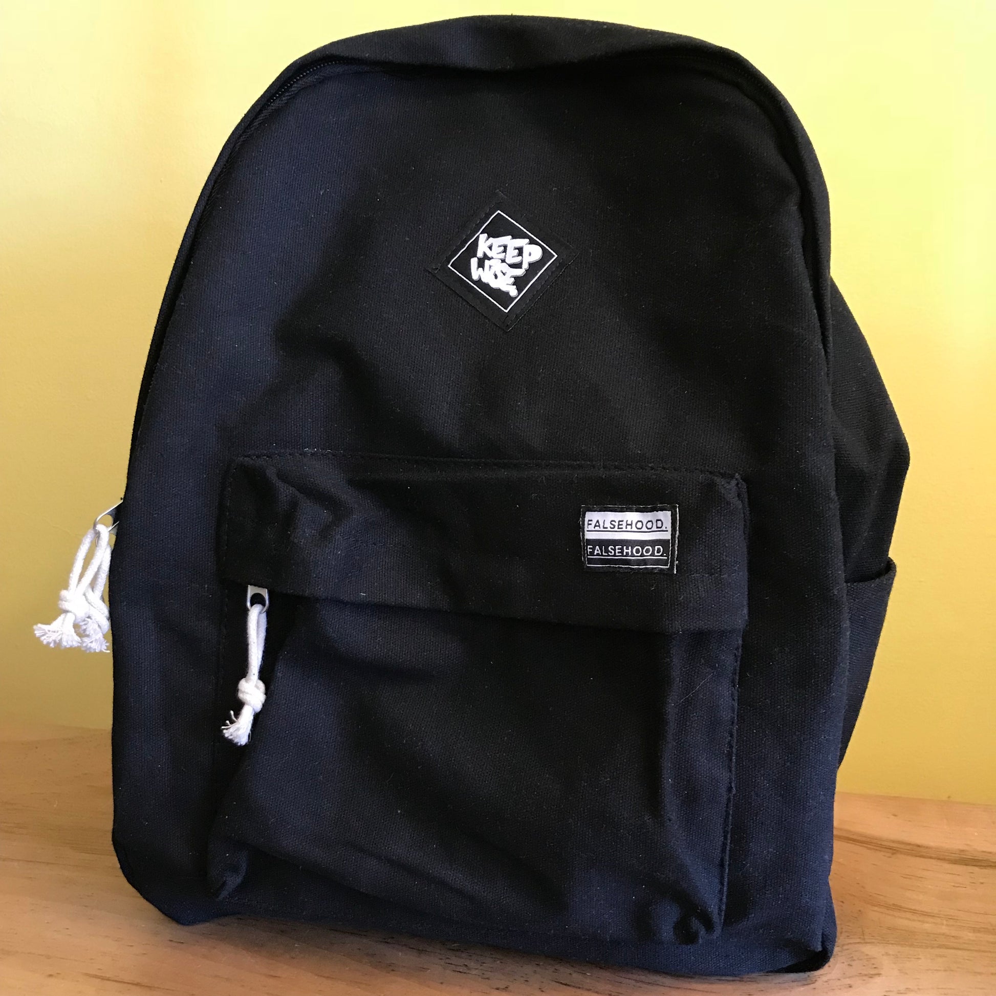 KEEP WISE. Backpack - FALSEHOOD.