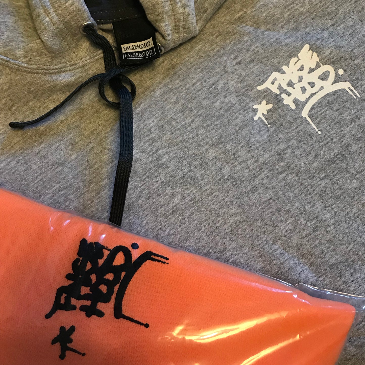 The TAG. Hoody - FALSEHOOD.