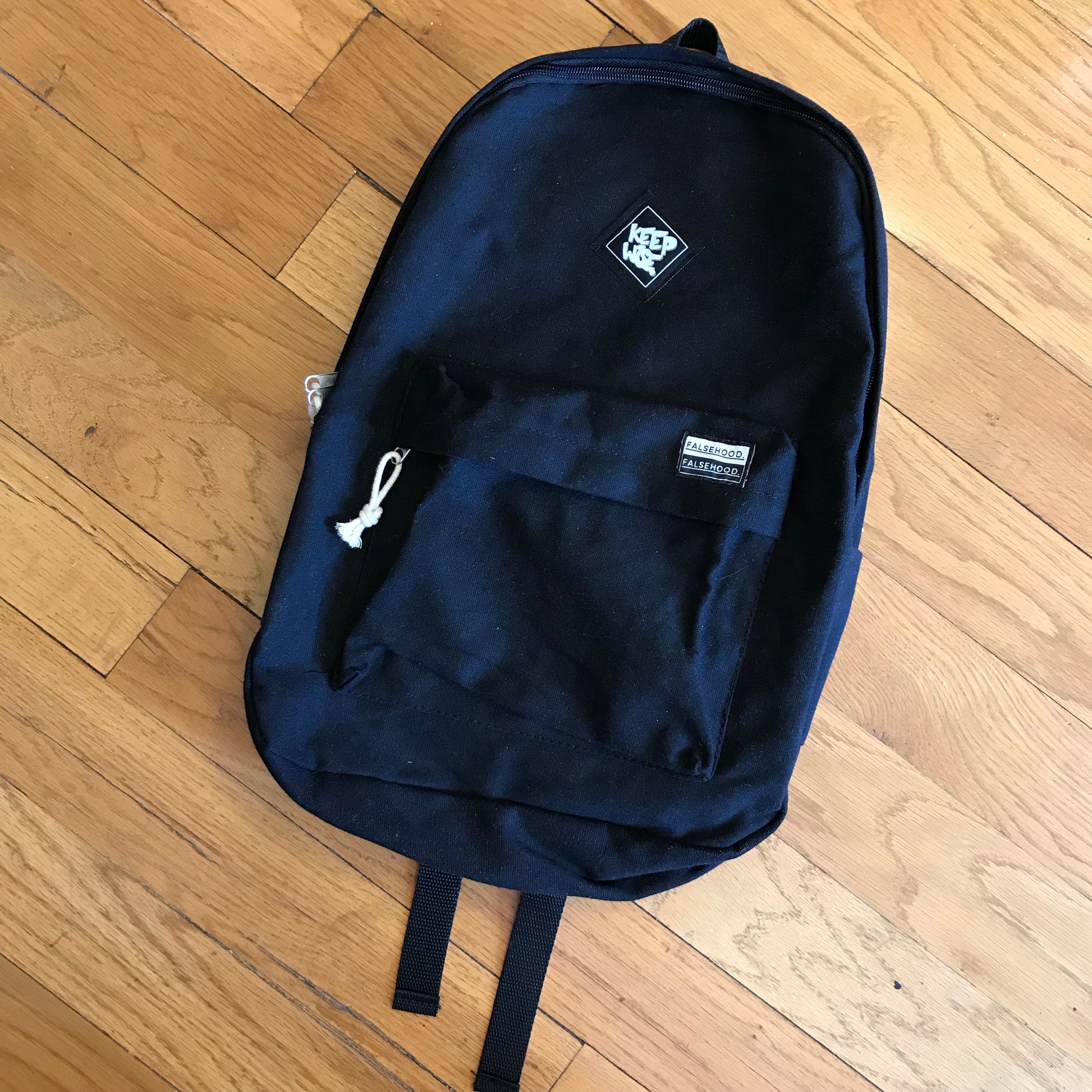 KEEP WISE. Backpack - FALSEHOOD.