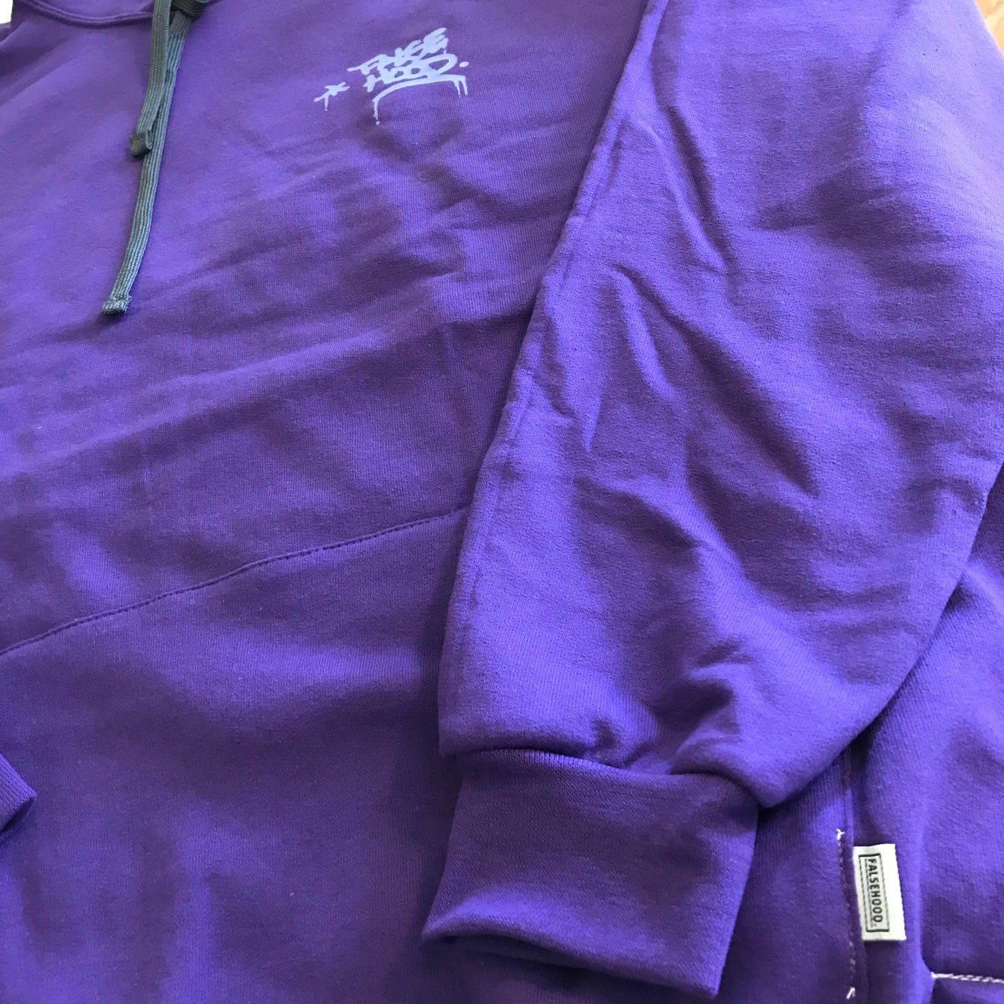 The Big TAG. Hoody - FALSEHOOD.