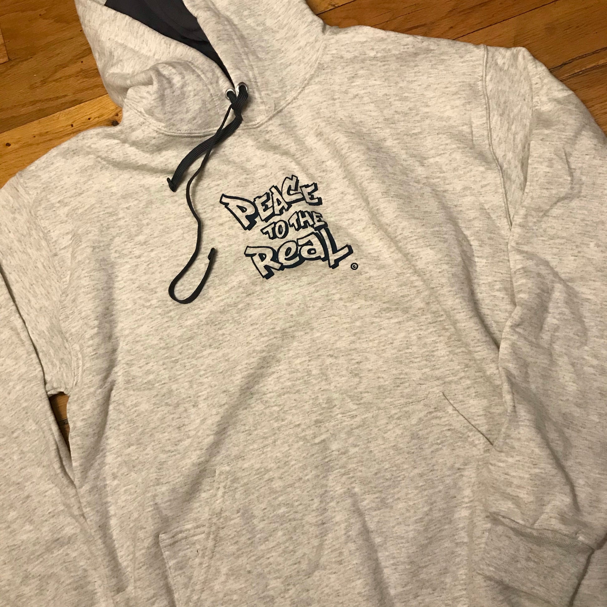 PEACE TO THE REAL. © Hoody - FALSEHOOD.