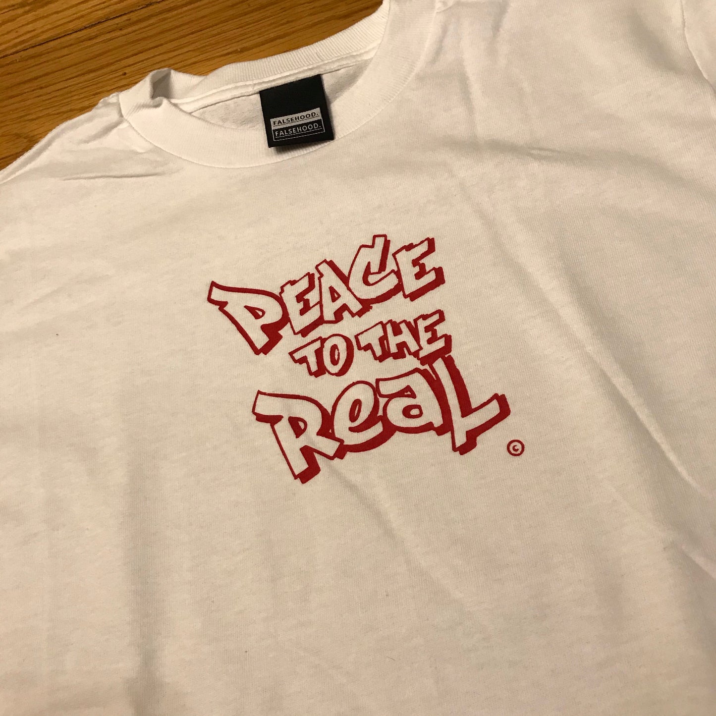 PEACE TO THE REAL. © Tee - FALSEHOOD.