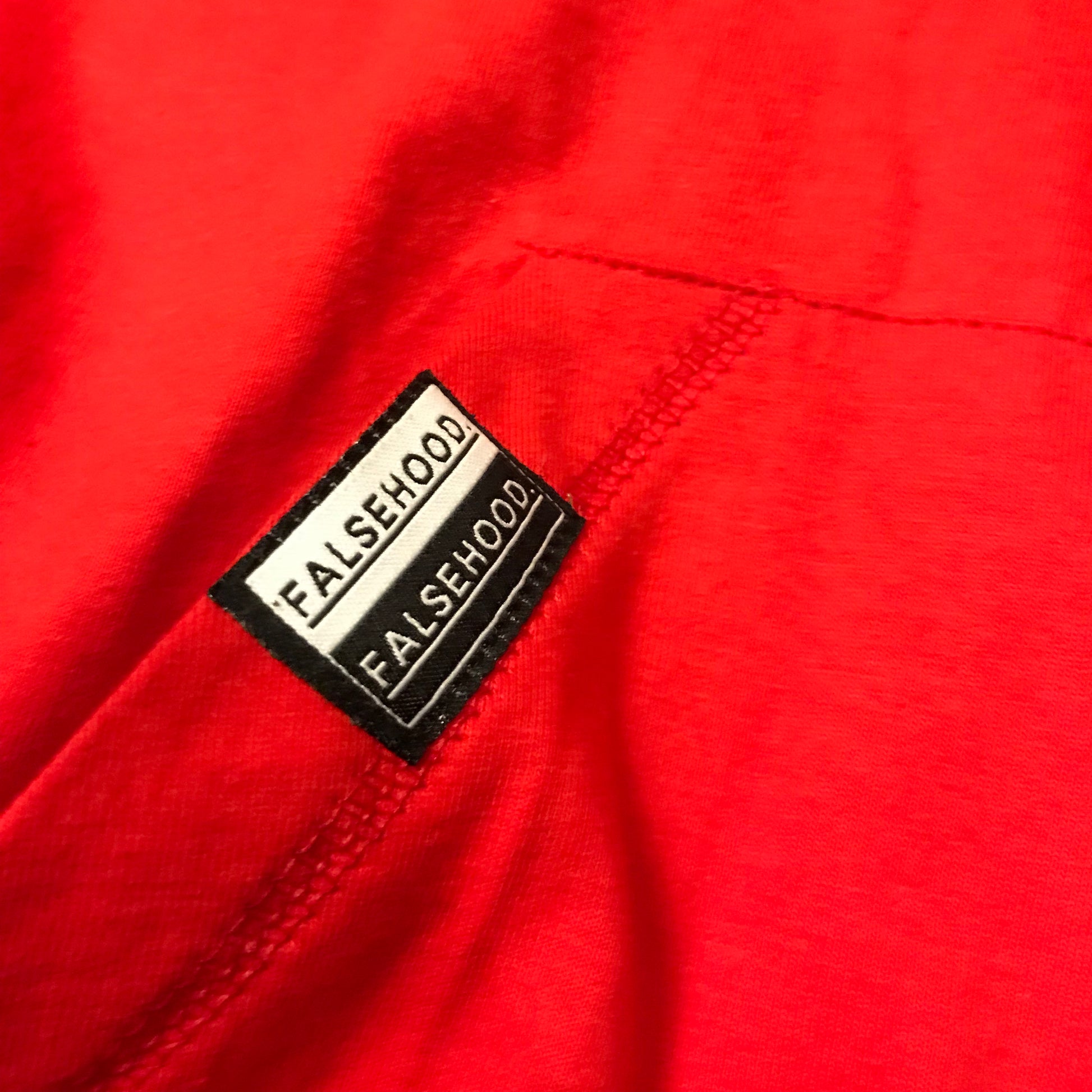 The Big TAG. Full-Zip Up Hoody - FALSEHOOD.